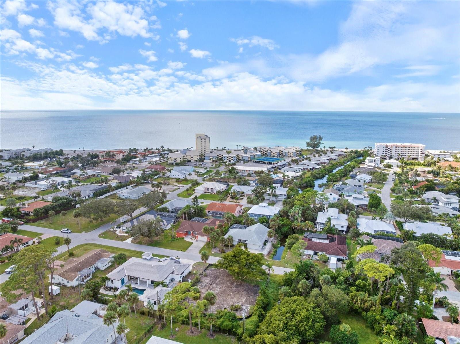 Build Your Dream Home on Venice Island! Rare opportunity to own a spacious .30-acre vacant lot in the exclusive Golden Beach community, one of the Gulf Coast’s most coveted locations. Nestled on a quiet, side street, this ELEVATED lot sits HIGHER than many surroundings and offers the ideal setting for your custom home, combining serenity with coastal charm. Just a short walk to your private deeded beach access, where you can enjoy the warm salt air, gentle waves, and soft sands—perfect for relaxing, unwinding, and the most magical sunsets. Venice Island offers a vibrant lifestyle where everything you need is just right outside your doorstep. Cruise the scenic streets by bike or golf cart and explore charming downtown Venice, filled with boutique shops, sidewalk cafés, weekly farmers' markets, and waterfront dining. Here, every day feels like a vacation, with breathtaking Gulf sunsets, cultural events, community festivals, and numerous beaches right at your fingertips. This expansive lot gives you the flexibility to design a custom home while embracing the laid-back coastal vibe of the area. With limited opportunities for new construction on the island, and even fewer with private beach access, this is a rare chance to secure your slice of paradise. Unsure of builders or what type of home to put on the property, I’ve done the work for you and have got some local builder plans. Don’t miss out—make Venice Island your forever home.