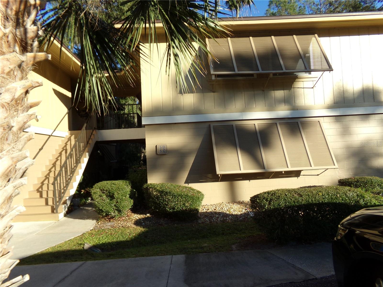 Wow! Looking for a first floor unit? You have found it! And the community pool is within view, and a short walk away from your enclosed Florida room! So, come and cool off in the pool or get a workout on the tennis courts! There is also a nearby walking trail and Green Springs Park where you can hike, picnic and enjoy nature! In the evenings, take a short stroll to the ramp at Lake Monroe for a gorgeous view of the sunset! This condo boasts 2 bedrooms, 2 baths and a spacious Florida room as well as a living/dining room combo off your kitchen. All appliances convey as well as the stackable washer/dryer combo. Please be aware that this is a no pet community(except for service animals.)Seller had a brand new A/C system installed in February 2025 and the community pool was refinished in summer of 2025 as well! Make your appointment today!