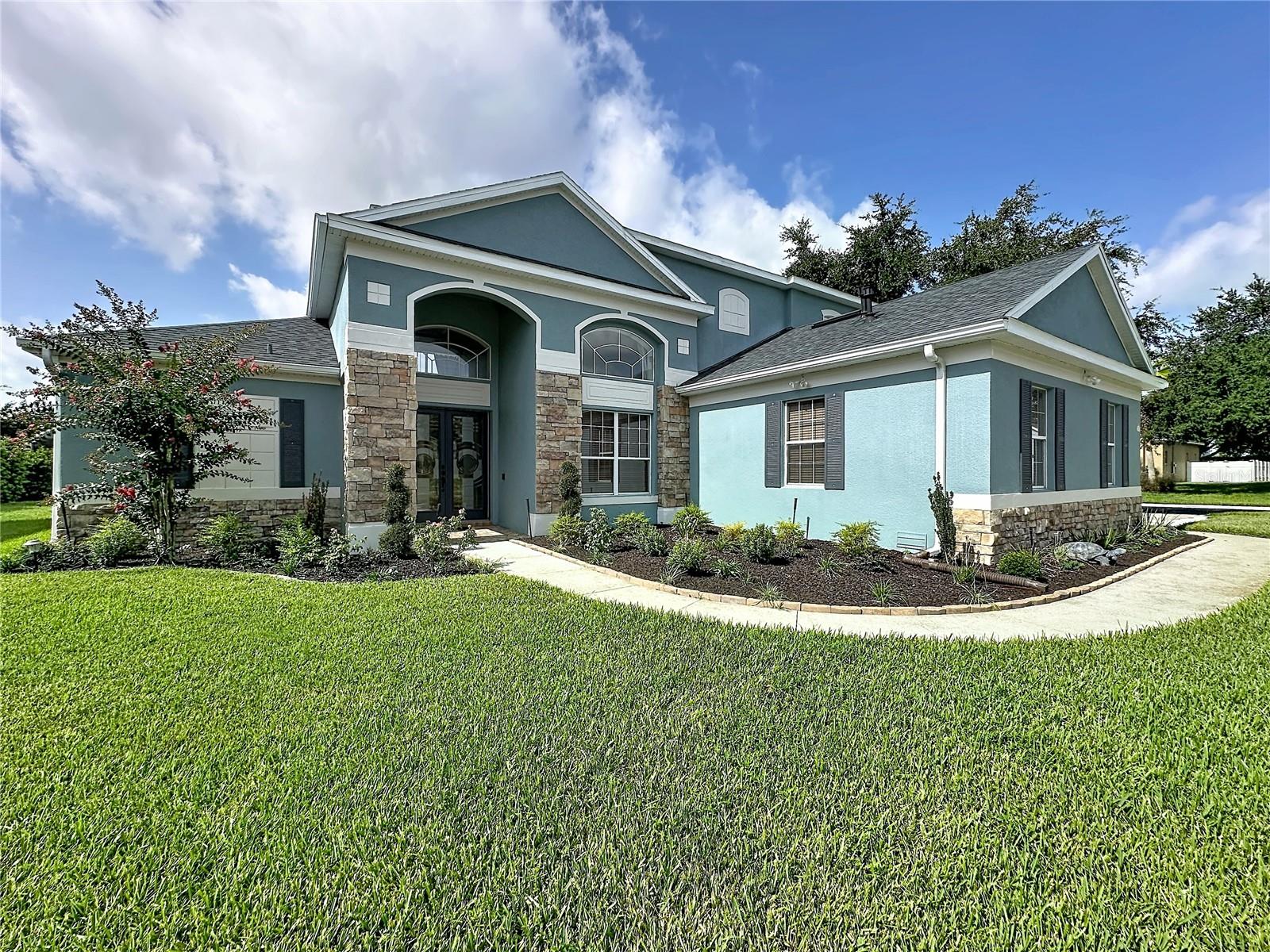 Luxury Corner-Lot Sanctuary in Gated Regency Hills | Private Pool & Gazebo
Step into luxury and effortless elegance in this stunning 4-bedroom, 3-bath two-story retreat, perfectly situated on a prime corner lot in Clermont’s coveted Regency Hills. From the moment you cross the threshold
through custom stained-glass entry doors, you'll be captivated by rich hardwood and tile floors, soaring coffered cathedral ceilings, and refined crown molding. Bathed in abundant natural light, the airy, neutral
decor creates a warm and inviting atmosphere throughout.
Main-Floor Luxury & Entertainment
Gourmet Chef's Kitchen: Bright and spacious, featuring sleek solid-surface countertops, a stainless farmhouse sink, a gas range, a large closet pantry, and seamless flow into the main family room—making
entertaining a breeze.
Primary Retreat: A tranquil main-floor oasis featuring a tray ceiling and an en-suite, spa-inspired bath complete with a garden tub, a massive separate shower, and dual vanities.
Added Convenience: A dedicated main-floor den (perfect for a home office), a pool bath with a shower, and a spacious laundry room.
Outdoor Living at Its Finest
Step outside into your personal backyard paradise:
Refresh in the custom pool, framed by an expansive paver deck.
Host unforgettable evenings under the private gazebo with built-in cushioned seating, or dine al fresco on the screened lanai.
Enjoy modern peace of mind with automated lighting and a brand-new roof.
Upper Level & Community
The second floor offers three generous bedrooms and a full bath with dual sinks—ideal for family or guests. Beyond your front door, the gated Regency Hills community features resort-style amenities including a community 
pool. This breathtaking home is minutes from top-rated dining, shopping, major highways, and healthcare facilities.
This home is an absolute must-see. Schedule your private viewing today!