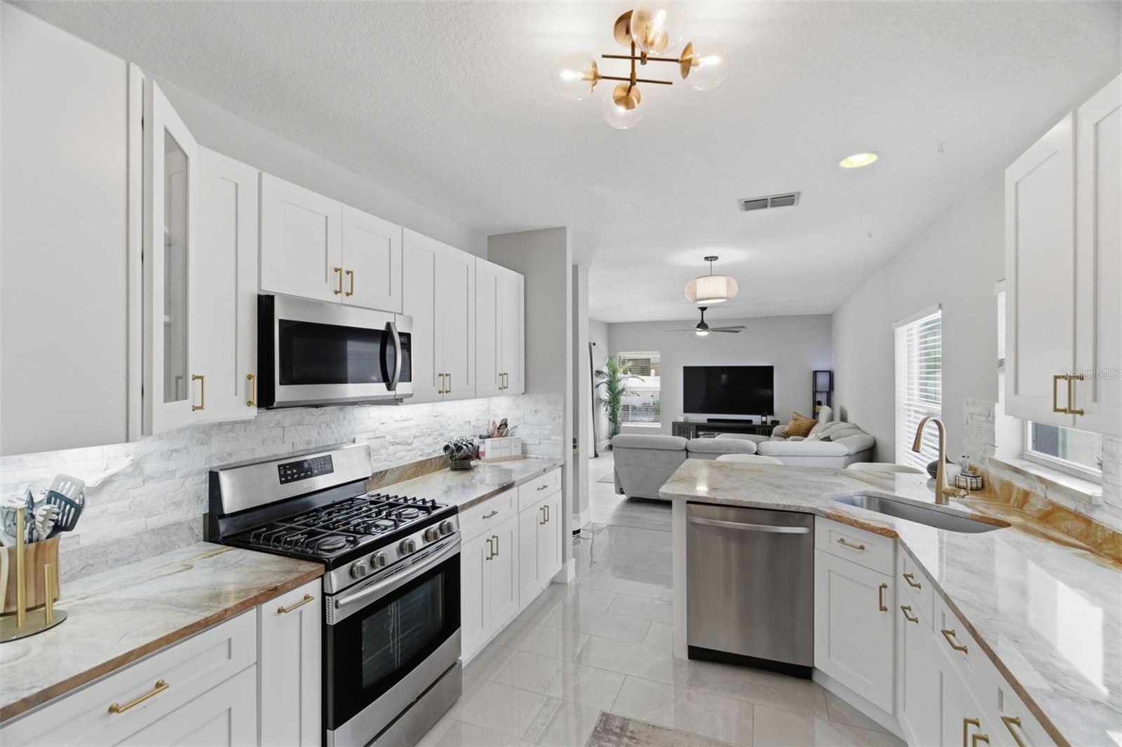 Welcome to this beautifully updated pool home located in one of Trinity's most sought-after neighborhoods. Offering 3 bedrooms, 2.5 bathrooms, and a 2-car garage, this move-in-ready residence combines stylish upgrades with everyday comfort.
The fully renovated first floor features new tile flooring, updated lighting, fresh interior paint, and a beautifully remodeled half bath. At the heart of the home is a stunning designer kitchen showcasing custom quartz countertops, all-new cabinetry, premium appliances, updated hardware, and breakfast bar seating. The open-concept layout creates a seamless flow between the kitchen and living spaces, making it ideal for both entertaining and daily living.
Step outside to your private backyard oasis featuring a sparkling pool and covered patio—perfect for relaxing, hosting friends, or enjoying Florida's year-round sunshine.
Major improvements include a newer roof (2020) and AC system (2022), providing added peace of mind for years to come. Conveniently located near top-rated schools, shopping, dining, parks, and everything Trinity has to offer, this home delivers the perfect combination of location, style, and value.
Don't miss your opportunity to own this exceptional Trinity pool home.