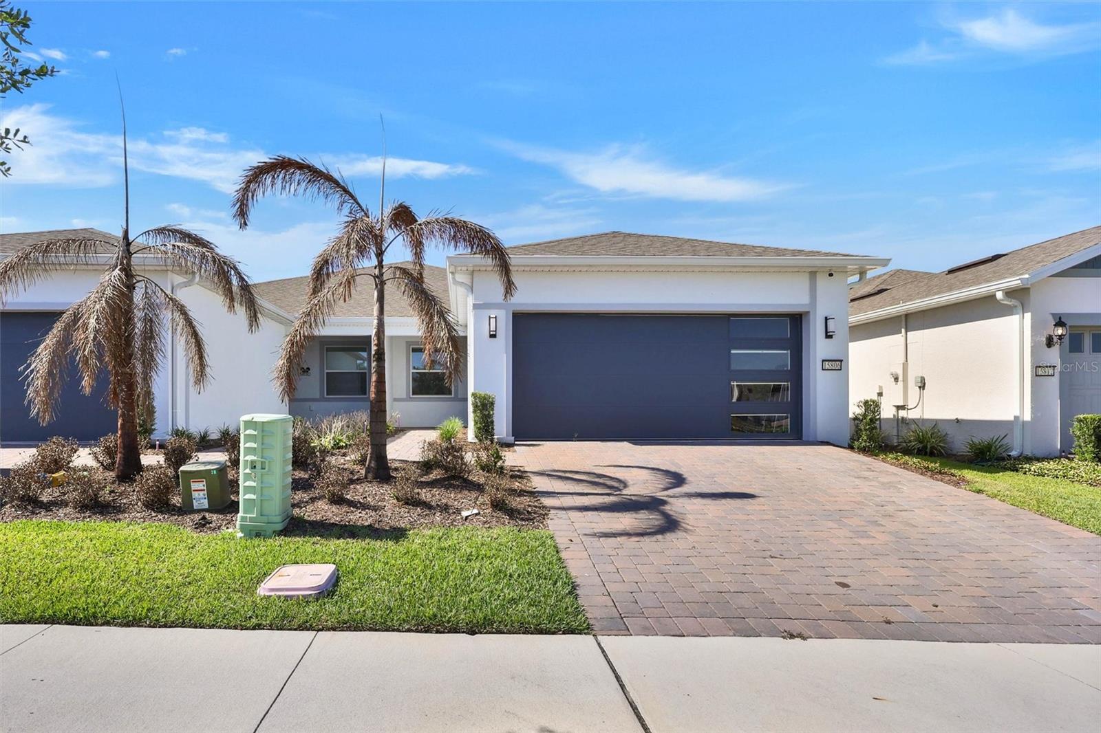 Built in 2024, this like-new home is located on a premium cul-de-sac lot within a sought-after community in Winter Garden. Offering exceptional privacy with no rear neighbors, the backyard provides a peaceful setting to relax and enjoy Florida's outdoor lifestyle. The community is designated as 55+; however, buyers of 25 years old are permitted to purchase within the community. This beautifully maintained residence combines modern construction, energy-efficient features, and a desirable open floor plan with access to outstanding community amenities. Conveniently located near shopping, dining, entertainment, and major roadways, this home offers the perfect blend of comfort, privacy, and convenience.