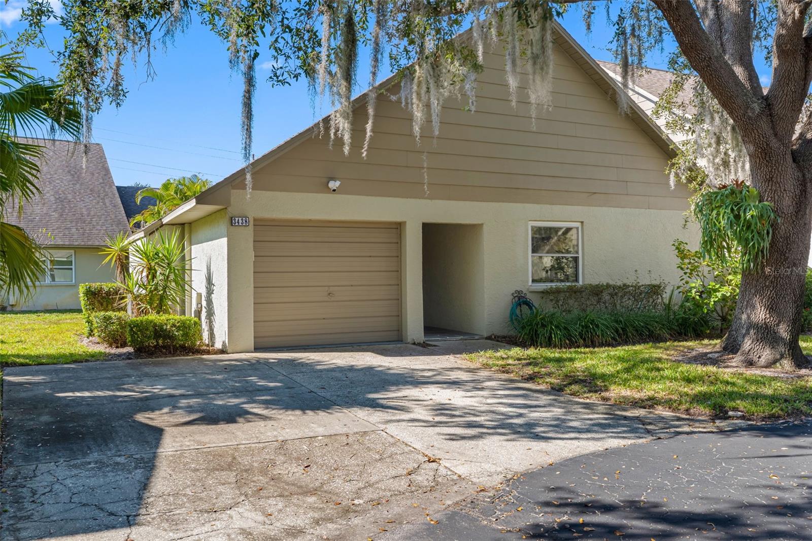 One or more photo(s) has been virtually staged. Location, Lifestyle, and Peace of Mind All in One!  Imagine living just minutes from award-winning Gulf beaches, championship golf, shopping, dining, and entertainment—all while enjoying the comfort of a spacious 3-bedroom, 2-bath condo featuring a BRAND NEW ROOF, High and Dry location with NO flood insurance required. Welcome to carefree Florida living in the heart of Clearwater. Located in a beautifully maintained, maintenance-free community with picturesque tree-lined streets and a sparkling pool just steps from your door, this home offers the perfect combination of comfort, convenience, and value. Inside, you'll find a bright and inviting floor plan designed for easy living and effortless entertaining. The eat-in kitchen provides a welcoming space for casual meals and morning coffee.  The spacious primary suite features an ensuite bath, creating a peaceful retreat at the end of the day. All three bedrooms feature walk-in closets, providing exceptional storage rarely found in condo living. A standout feature is the air-conditioned enclosed bonus room offering year-round comfort and valuable living space. Whether you envision a home office, reading retreat, hobby room, fitness area, or TV lounge, this versatile space adapts to your lifestyle. Adding to the home's convenience are three parking spaces, (1 garage, 2 on slab) a rare and highly desirable feature that provides plenty of room for residents and guests. Enjoy being centrally located near two international airports, world-famous beaches, and professional sports venues. Everything you love about Florida living is just minutes away.  Hurry to see it today!

Whether you're searching for a full-time residence, seasonal retreat, or a low-maintenance lifestyle, this move-in-ready home delivers what today's buyers want most: Location, Lifestyle, and Peace of Mind—all in one exceptional package. Hurry to see it today!