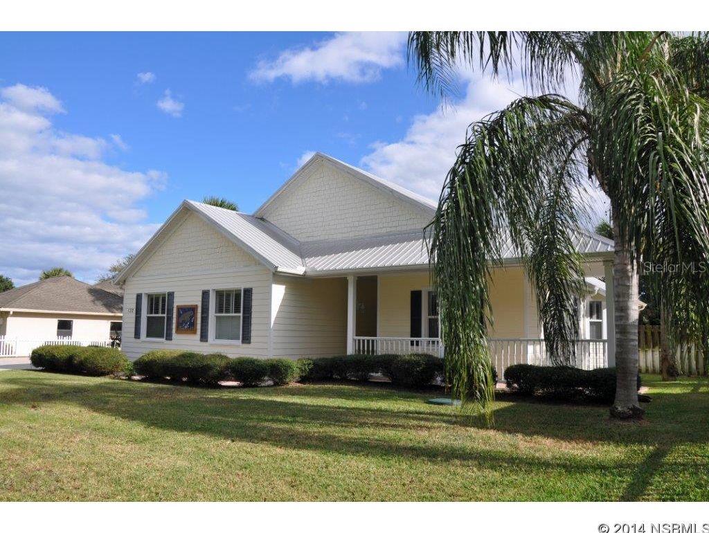 Deepwater canalfront pool home with covered dock & 2 lifts.  Built in 2005, this immaculate home has granite & stainless kitchen with wet bar, master suite with tray ceilings & granite bath with whirlpool.  Office doubles as safe room. Solid concrete construction with Hardieboard siding, metal roof & impact windows.  Tiled throughout with high ceilings, etched glass doors & glass block.  Oversized 2 car garage plus extended paver parking.  Fenced yard.  RV pad with 50 amp electric service.  Home wired for generator.  Office has built in desk.  Florida Room makes great sunroom or space for fishing gear storage.  Lots of decks & porches.   Easy access to Intracoastal. ;Water: City