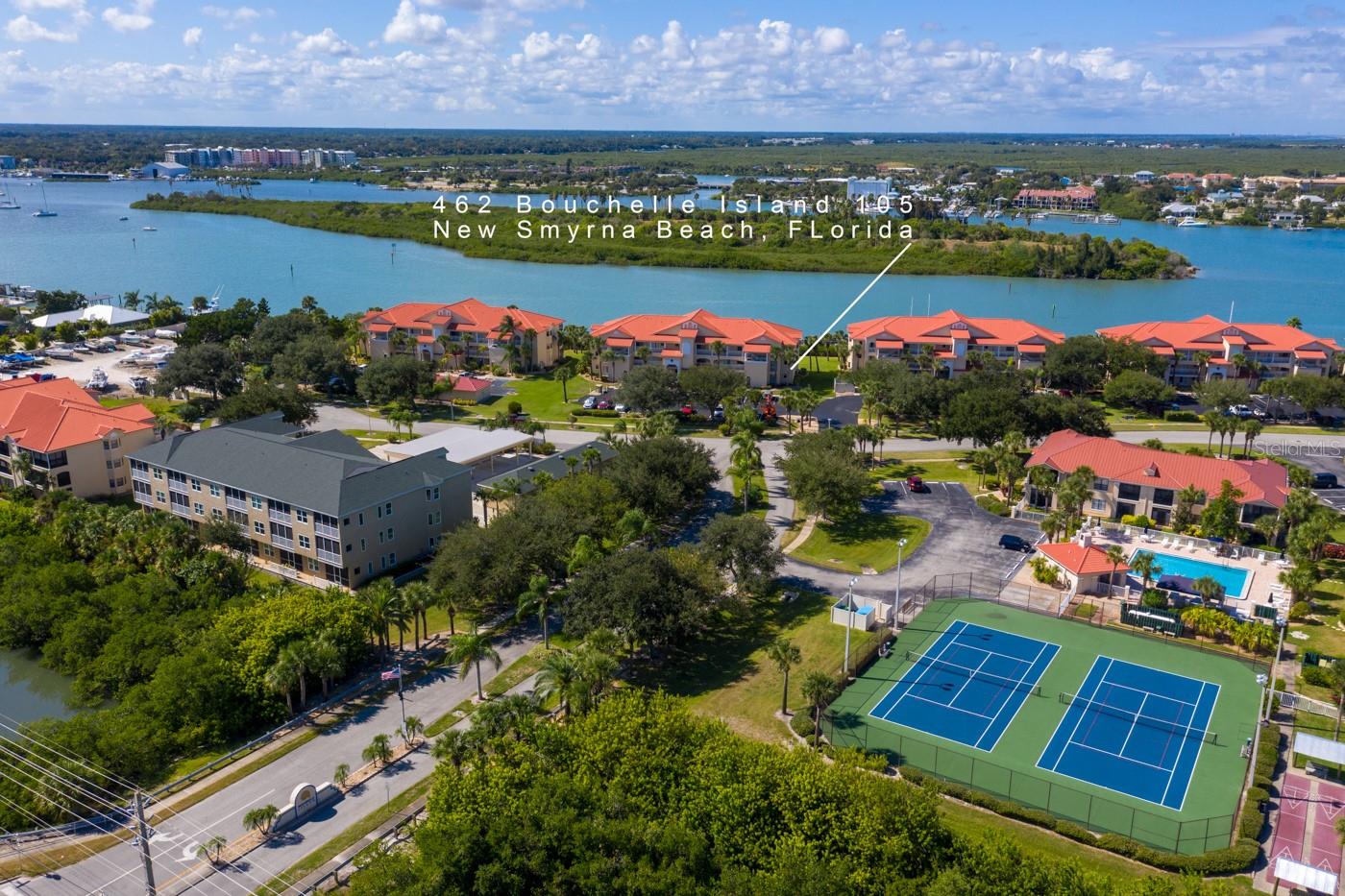 Are you looking for your little piece of paradise on the water in New Smyrna Beach ? Well you have just found it! This 2 bed 2 ba end unit in Bouchelle Island is a direct Intercoastal unit and located on the ground floor for easy access.
This condo has a great lighting and a newer ac from 2015, tile and carpet throughout, breakfast bar, inside laundry with a full size washer and dryer, huge walk in closet in the master bedroom and a lovely relaxing enclosed lanai  with easy open windows, located on the water to sit and watch the sailboats go by, dolphins swim and beautiful sunsets.
Amenities include, two heated pools, a spa, a clubhouse, 18 hole pitch putt golf course, a state of the art fitness center, lighted tennis courts & lighted shuffle board courts, car wash area, boardwalk along the intracoastal that's perfect for walking, dry boat storage with storage racks for your canoes, kayaks and paddle boards, wet boat slips and private boat ramp. ;Water: City