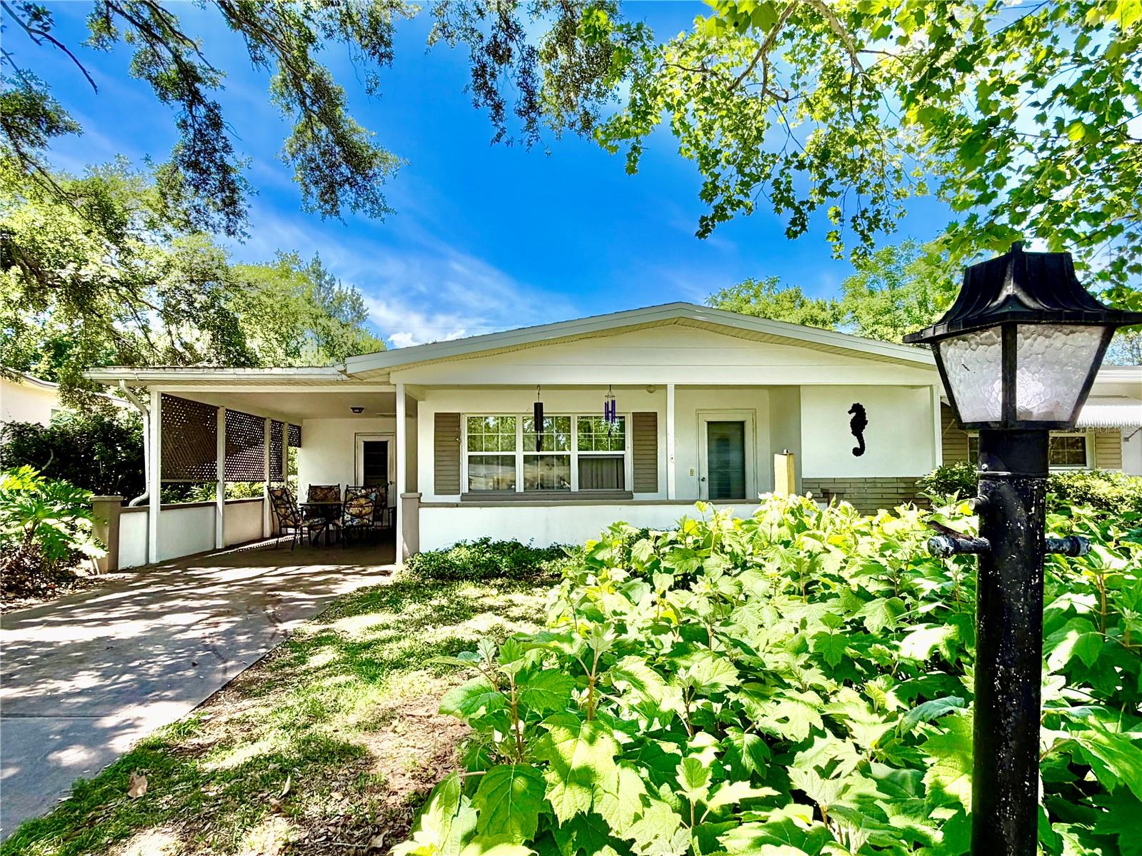 Enjoy peace of mind for years to come in this well-maintained home. Major updates already completed include a NEWER roof (2023), HVAC system (2019), hot water heater (2019), and three updated windows, all contributing to improved efficiency and long-term value.
 Inside, you’ll find tile flooring throughout, quartz countertops, and a freshly painted living room and back bedroom, creating a bright and inviting space.
The layout offers both functionality and flexibility with a separate dining room for formal gatherings, as well as an additional dinette area in the kitchen—perfect for casual, everyday meals.
Additional highlights include a SPACIOUS laundry room with ABUNDANT storage and utility space, an irrigation system, and a versatile enclosed Florida room—ideal for a craft room, hobby area, or extra living space, complete with ample built-in shelving.
Step outside to enjoy a small shed, fenced-in backyard, ideal for pets or entertaining, along with a beautifully shaded front porch surrounded by mature landscaping, creating a peaceful place to relax and unwind.
Location is everything! This home is less than a mile distance to Beverly Hills Community Park, featuring a scenic water fountain pond, jogging trails, and plenty of space for dog walking. Nearby churches, parks, trails, ponds, and neighborhood amenities enhance the welcoming, small-town atmosphere.
Residents also enjoy close proximity to Central Ridge Community Park, known for its championship horseshoe complex, and Twisted Oaks Golf Club for exceptional local golfing.
Nature lovers & fishing enthusiasts will appreciate being just a short drive from Three Sisters Springs, Fort Cooper State Park, and the Citrus Wildlife Management Area—perfect for outdoor adventures like kayaking, hiking, and manatee viewing.  Enjoy the 47 mile paved walking trail with lush greenery & occasional drinking fountains, even for our furry friends.
Conveniently located in central Citrus County, this home offers 1-3 mile drive to shopping, dining, and everyday essentials while maintaining a serene, well-kept neighborhood setting.
Don’t miss the opportunity to own a beautiful home next to a great community center & park in one of Citrus County’s most charming communities!