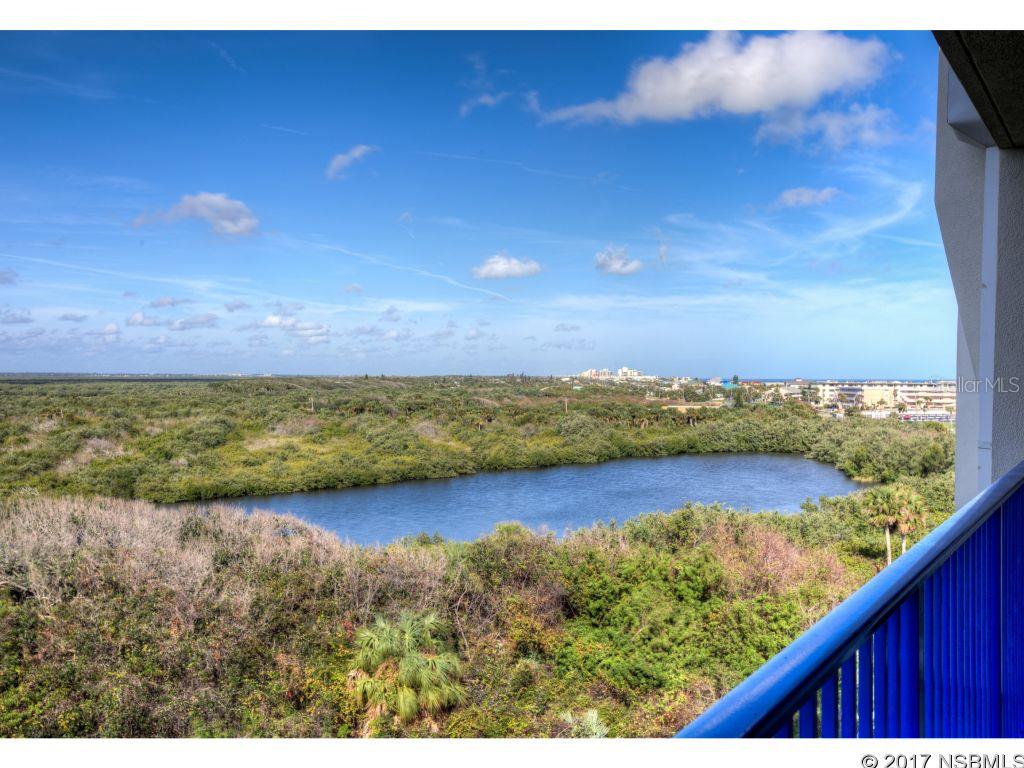 This Rarely offered MINI PENTHOUSE 3/3 floor plan has it all and is move in ready.  Two of the 3bedrooms are private oversized master suits each boasting their own full bathroom featuring separate shower, and double vanities.  Other features include a Jacuzzi tub in one of the en suits, large walk-in closets, and entry to the balcony.  As you sit back and relax on the large oversized balcony, you can take in unobstructed peaceful natural views of wild life in the estuary of Floridaâs Intra-Coastal Waterway.  The 3rd guest room offers a view of the Atlantic Ocean.  Ocean Walk Condoâs have an impeccable reputation for luxury offering  2 community pools, tennis courts, nature trail, basketball court, sauna, spa, BBQ areas and many social activities. This is a well managed building with gated access, secure covered parking and low condo fees which include water and cable TV. New Smyrna Beach is a barrier island situated between the Indian River and Atlantic Ocean. Enjoy miles of beautiful beaches, collect sea shells, sail, surf, wind surf, deep sea fishing.  This unit is priced to sell, Call TODAY. ;LocationDescription: Condo ;Water: City