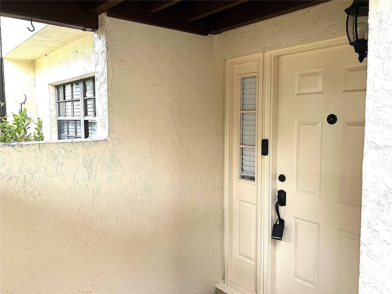 Updated, fresh and clean with all new interior paint making this perfectly located condo pristine and move in ready. Lake Dot Villas are conveniently located just a few blocks from Historic Downtown Clermont. Walk to dinner and enjoy a meal at one of the downtown restaurants or have a couple of beers at the local brewery. If you enjoy fresh produce and local artisans, you can attend the weekly farmers market or indoor artisan market located at the Clermont City Center in downtown. Looking for an exiting evening out, attend one of the monthly events at the Water Park on the shores of Lake Minneola or dance the night away to a live band at one of the local establishments. If you prefer an active outdoor lifestyle the South Lake trail is close by. If you're up for it, you can train for the yearly triathlon. This centrally located condo was built in the days when homes were built to last. It is the perfect winter home for a snow bird, a great home for a young couple or someone looking to downsize, and would also work perfectly for a single guy or girl. It has been built solid and well taken care of by the young family that recently bought a larger home to accommodate their growing family. They updated the kitchen with stainless steel appliances, new tile flooring, granite counter tops with breakfast bar and fresh paint throughout. The bathroom was updated with the installation of an additional stand alone sink and granite counter tops. It also has fresh paint throughout. At the back of the condo, the screened in porch offers private, serene views of lake dot and open green spaces. An excellent spot to unwind after a long day or entertain guests at the brick paved deck outside the porch...the perfect place for a BBQ grill. A generous storage closet is located in the screened in porch. The buildings have been re-roofed in 2024 and also received new exterior paint in 2024. In 2025 all the stairs were redone and the parking lot has just gotten a new layer of blacktop, where each owner gets 2 designated parking spots. Just bring your belongings and begin living your new life in this charming and quiet community with an excellent location close to hwy 50 and hwy 27, grocery stores, shopping, and medical centers. Perfect for an active outdoor live style, whether a year round residence or winter home.