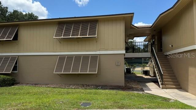Beautifully designed unit. This condominium is a opportunity to secure a highly desirable, low maintenance asset within a tranquil, well maintained riverfront community. 
The interior is move in ready with beautiful tile backsplash in kitchen and bathrooms, along with ,  fresh paint, wood floors, and tiled floors! It also has a glassed in patio. This upstairs 2 bed, 2 bath unit with private entrance, overlooks the beautifully maintained tennis courts from its large screen enclosed patio. 
There is also a community pool and a public boat ramp.