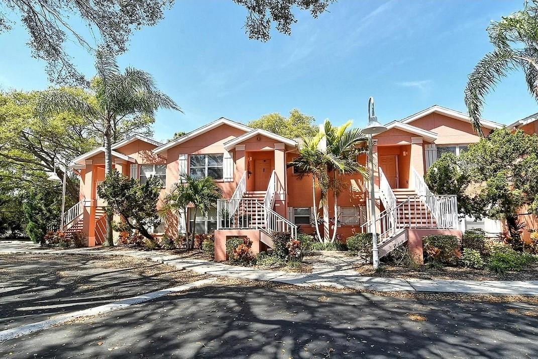Beautiful condo in a well-maintained community — perfect as a primary residence, seasonal home, or investment property. Location, location, location! Come see this spacious condo located in the heart of Sarasota. You are just 2.5 miles from University Town Center, I-75, shopping and dining. Sarasota Bradenton International Airport, downtown Sarasota, and beautiful Sarasota Bay are within 15 minutes. Longwood Park is only 0.4 miles away and here where you can enjoy dog-friendly areas, tennis and pickleball courts, basketball courts, baseball fields, a playground, gymnasium, a recreational building and more. This well-maintained condo offers two bedrooms and two bathrooms. An inviting open floor plan features a spacious great room, kitchen and dining area. Beautiful, engineered wood floors cover the entire condo. No carpet in this property! New water heater was installed in February 2026.  You can enjoy scenic view from the covered and screened lanai. The community only has 16 condos. HOA fees cover your water/sewer, cable TV, interior/exterior pest control, exterior power washing/maintenance, irrigation/landscaping maintenance, as well as common area taxes and insurance.