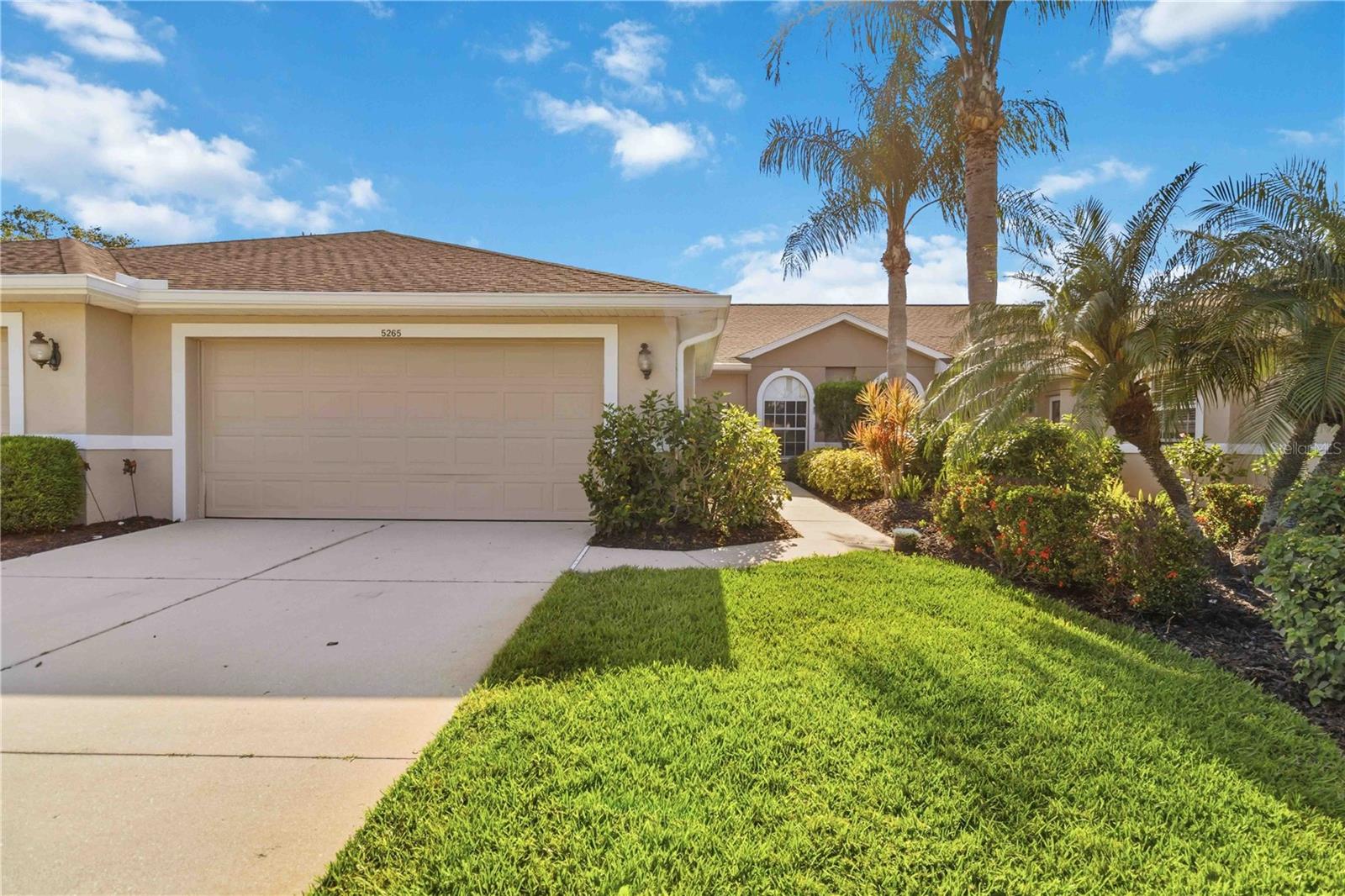 Dramatically reduced! This is an unbelievable price. Welcome to one of the best values in the Sarasota–Manatee region, tucked behind the gates of the highly sought-after Heritage Oaks Golf & Country Club—a rare, debt-free golf community celebrated as much for its lifestyle and sense of community as its exceptional amenities.  This Buttonwood model Club Home features 2 bedrooms and 2 full bathrooms. Also equipted with a hurricane shutter on the lanai for peace of mind!

This move-in-ready residence offers a bright, efficient layout thoughtfully designed for comfortable everyday living. Luxury vinyl flooring welcomes you inside and leads to a spacious living area, while the screened lanai provides peaceful lake and golf course views—the perfect setting for morning coffee, afternoon tea, and daily entertainment from local wildlife and golfers passing by.

Life at Heritage Oaks extends far beyond the golf course. Residents enjoy access to a fully private championship golf course with remarkably low entry fees, along with tennis, swimming pool, fitness facilities, fine and casual dining, and a vibrant social calendar. The recently renovated and expanded clubhouse serves as the heart of the community, bringing neighbors together for everything from casual gatherings to organized events.

While Heritage Oaks has long been known as a premier seasonal destination, it also presents an outstanding opportunity for full-time living. 

With strong financial stability, exceptional amenities, and an unmatched lifestyle-to-price ratio, this home delivers first-class country club living, genuine community, and incredible value. At Heritage Oaks, the best part isn’t just the golf—it’s the people.

Schedule your private tour today!