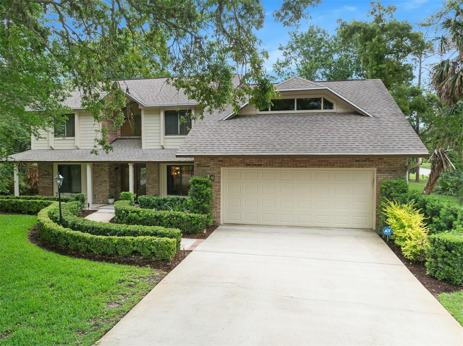 Custom-Built Brick Beauty in Breakaway Trails! Tucked away on a quiet cul-de-sac in the desirable Breakaway Trails, this elegant brick home blends timeless charm with modern updates. Step inside the soaring foyer filled with natural light, leading into the spacious Great Room featuring a cozy fireplace and French doors that open to the oversized screened-in heated saltwater pool—perfect for year-round enjoyment. The completely renovated kitchen is a chef’s dream, showcasing a premium 6-burner Thermador gas cooktop, stylish finishes, two pantries for ample storage, and stunning bay windows that frame tranquil views of mature trees, lush landscaping, and visiting deer and wildlife. The kitchen flows into both a formal dining room and a casual breakfast nook—the central hub for daily life.The thoughtfully designed layout includes the primary suite, a guest bedroom and full bath, and a spacious laundry room with built-in cabinets and direct access to the side yard—all conveniently located on the main level. The primary en suite features dual vanities, a walk-in shower, a walk-in closet, and French doors that open directly to the lanai. Upstairs, you’ll find three additional bedrooms and another full bath, perfect for family or guests.The versatile den/office/bonus room includes French doors and is ideal for working from home, hobbies, or playroom for the little ones. Tons of closet space throughout adds to the home’s exceptional functionality.Major updates include a new roof and hot water heater (2017), gas stovetop, pool enclosure, and garage door (2018), new refrigerator and washer/dryer (2026), and a 3-zone HVAC system installed in 2021 and 2022 for optimal comfort throughout the home. This is a rare opportunity to own a beautifully updated, move-in ready home in one of Ormond Beach’s most sought-after gated communities.