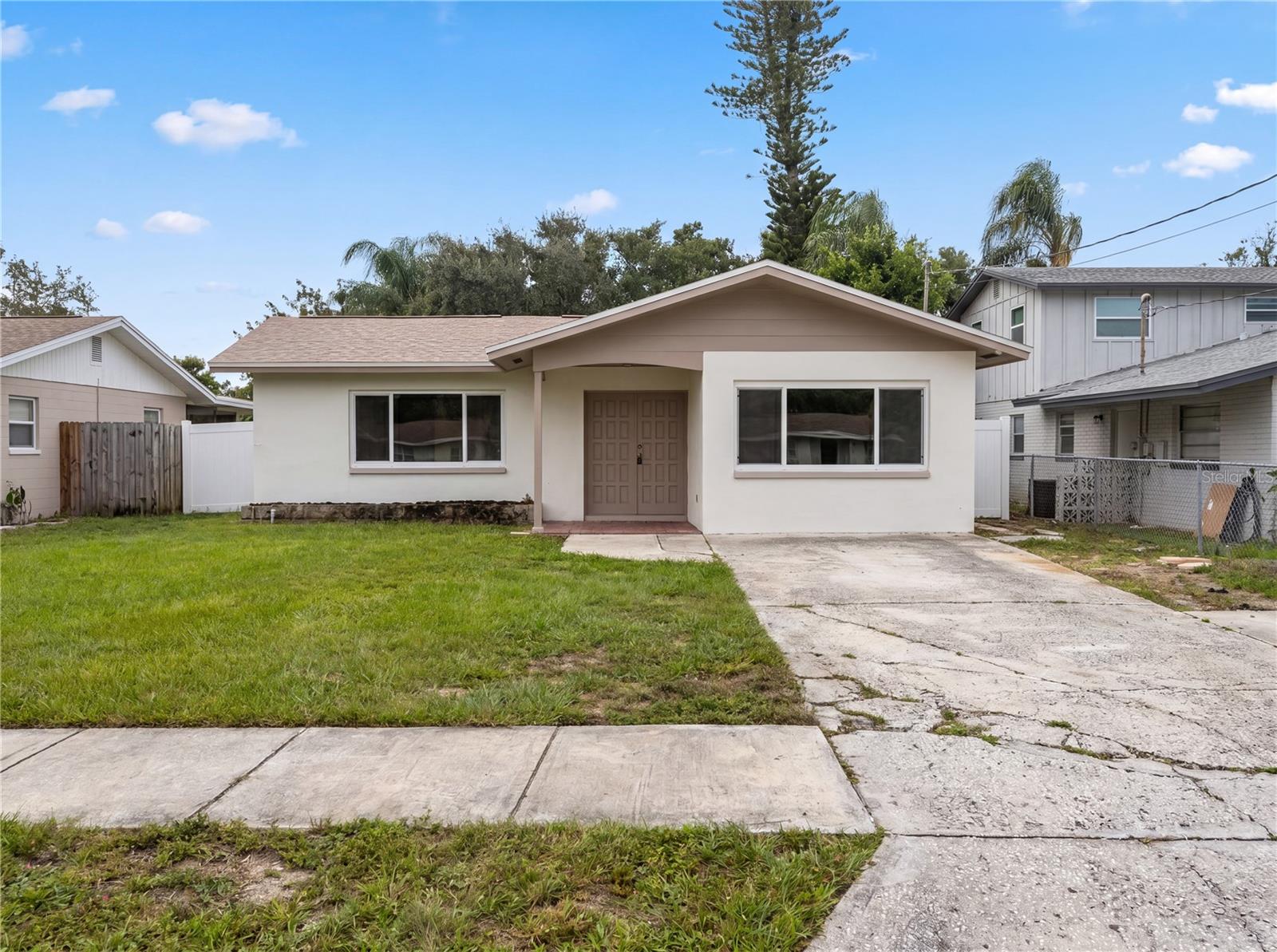 Discover this charming, move-in-ready home located just minutes from the sparkling Gulf 
waters and the highly regarded Tarpon Springs High School. Offering the perfect blend of 
comfort and convenience, this property features a bright, inviting kitchen with a breakfast bar, 
abundant cabinetry, and plenty of room for meal prep and gathering. 
With 3 well-appointed bedrooms and 1.5 baths, this home provides flexible living space for 
guests, hobbies, or everyday comfort. You’ll also appreciate the dedicated home office, ideal for 
remote work or creative projects. 
Step outside to a fully fenced backyard, perfect for pets, gardening, or weekend relaxation. 
Opportunities like this — combining location, lifestyle, and value — don’t come around often. 
Act fast before this gem is gone.