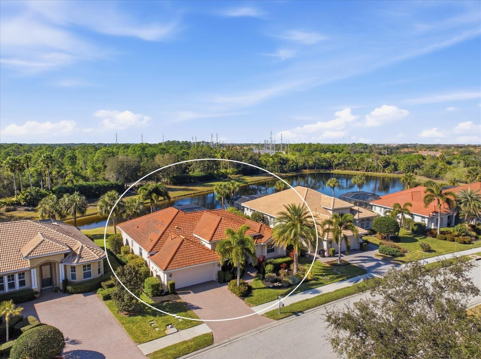 One of the best values for a pool home in Venetian Golf & River Club!
Your piece of paradise awaits in the highly sought-after gated community of Venetian Golf & River Club. Perfectly positioned on a quiet, private lot overlooking a tranquil lake, this beautifully maintained Angelico model offers the ideal blend of comfort, space, and Florida lifestyle living.
This spacious home features three bedrooms, two bathrooms, a family room, formal living room, and formal dining room, providing flexible living and entertaining space for both everyday living and hosting guests.
The open kitchen serves as the heart of the home and features 42" wood cabinetry, granite countertops, under-cabinet lighting, a pantry, breakfast bar, and a dining nook that overlooks the pool and peaceful water views.
Recent updates provide peace of mind, including a new HVAC system installed in 2023, new hot water heater installed April 2026, along with a brand new refrigerator and brand new dishwasher.
Step outside to your private outdoor retreat where the screened lanai overlooks the sparkling pool and serene lake. The lanai is equipped with a summer kitchen gas hookup and surround sound wiring, creating the perfect setting for entertaining or relaxing evenings.
Impact hurricane glass windows and doors throughout provide both security and energy efficiency. The spacious primary suite features tray ceilings and tranquil lake views through triple sliding glass doors, while the ensuite bathroom offers a soaking Jacuzzi tub and walk-in shower for a true spa-like retreat.
Additional highlights include central vacuum, large diagonal tile flooring, security system, surround sound wiring in the family room, and a premium water-view homesite with preserve.  This home is also NOT located in a Flood Zone. 
Located just minutes from Gulf beaches, shopping, dining, and historic downtown Venice, residents of Venetian Golf & River Club enjoy exceptional amenities including resort and lap pools, fitness center and aerobics studio, fine dining overlooking the 70-acre nature park along the Myakka River, Har-Tru tennis courts, pickleball, scenic walking trails, and a championship 18-hole golf course.
This home offers the perfect combination of privacy, location, and Florida lifestyle living in one of the area's most desirable communities.