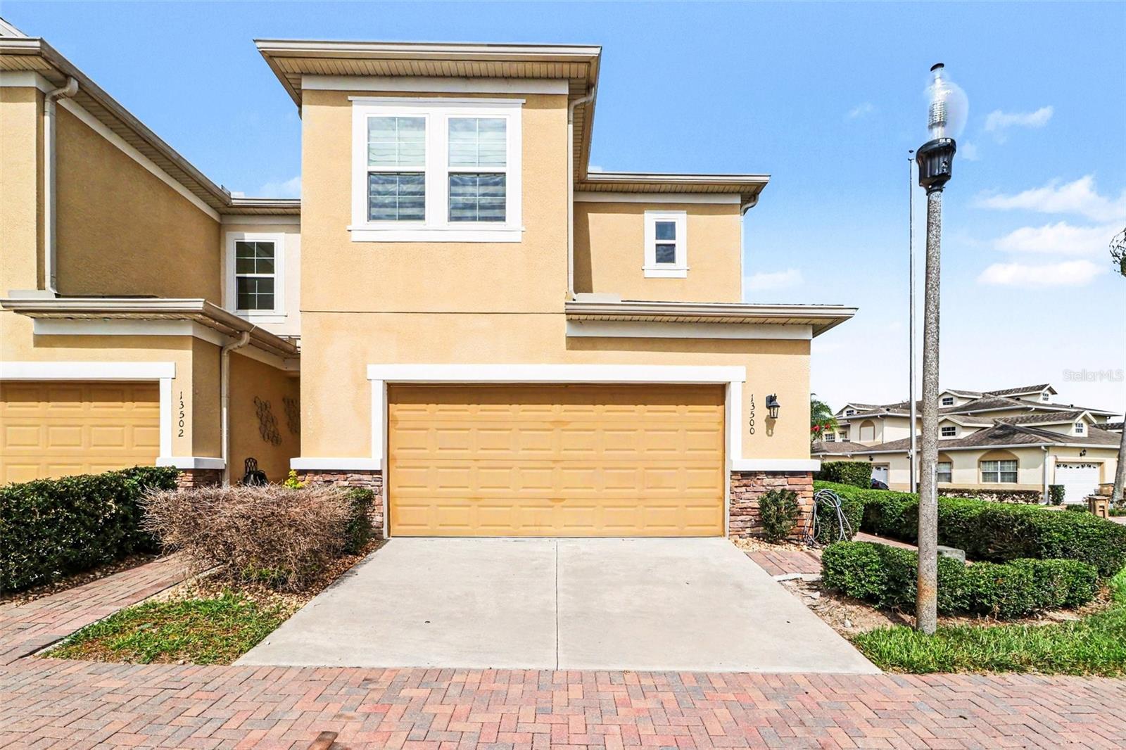 Step into this stunning 3-bedroom, 2.5-bath, end-unit two-story townhome in the prestigious
24/7 guard-gated community of Magnolia Pointe, where resort-style living meets unbeatable
convenience. This beautifully designed home checks every box—style, space, security, and
amenities—all just moments from the best of Clermont and Winter Garden.
Inside, an open-concept layout seamlessly connects the living, dining, and kitchen areas,
creating the perfect setting for entertaining or effortless everyday living. Enjoy smooth
indoor-outdoor flow to the screened-in lanai, ideal for relaxing, grilling, or soaking in the
Florida breeze.
The modern kitchen shines with stainless steel appliances, bar seating, and abundant cabinetry.
A convenient half bath completes the main level.
Upstairs, the primary suite offers a peaceful retreat with a walk-in closet and a private
balcony—your own quiet escape. Two additional bedrooms provide flexibility for guests,
hobbies, or a growing household. A 2-car garage adds even more convenience and storage.
Magnolia Pointe delivers an impressive lineup of resort-inspired amenities, including a
sparkling community pool, fitness center, clubhouse with billiards, pickleball, tennis, and
basketball courts, plus private Johns Lake access for boating and fishing enthusiasts.
Perfectly positioned near the Florida Turnpike, Hwy 50, Costco, Publix, and the charming
downtowns of Clermont and Winter Garden, this location offers quick access to Orlando
International Airport, top hospitals, and world-class attractions.
This townhome brings together style, space, views, and value in one exceptional package.
Don’t miss your chance to make it yours.