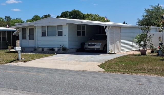 Looking for a home where you OWN YOUR OWN LAND with many updates than look no further. This 2-bedroom, 1 bath mobile home features updated Kitchen with Breakfast Bar, remodeled bathroom, New A/C and heat 2023, Electrical Panel replaced approximately 3 years ago, roof replaced 10 years ago, all with county permits. County sq. ft. does not include the 2nd bedroom with window AC, could be used as a Office or Craft room, bonus room is being used as formal dining room with closet space. Outside features room for 4 car parking, back yard has a second kitchen for outside entertaining, plus a tall 6 ft. vinyl privacy fence, patio, and a mature avocado tree. Home is located in an Active 55+ Community with a low $200. yearly HOA fee.  By appointments only call Listing Agent for appointments. Buyer to verify all information deemed to be accurate. Measurements are approx.

Buyer to verify all information deemed to be accurate.