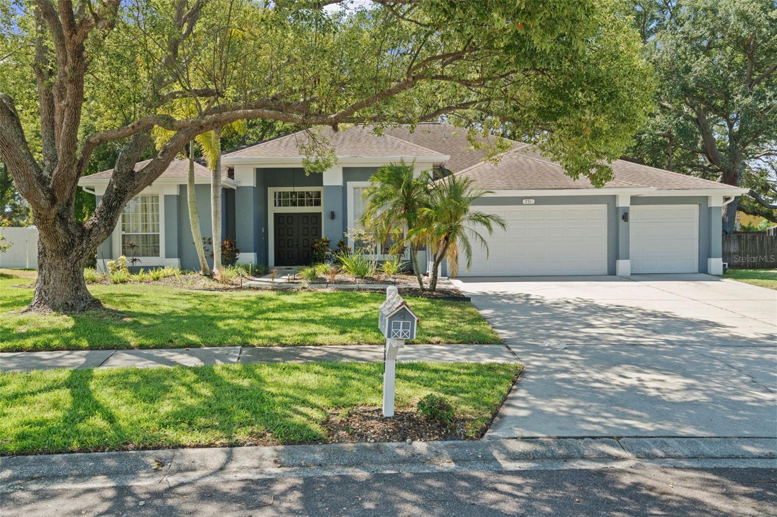 Welcome to one of the most exceptional homes in the highly sought-after, golf cart-friendly community of Pipers Meadow. Situated on nearly half an acre, this pie-shaped homesite is one of only four of the largest lots in the neighborhood, offering an incredible combination of privacy, space, and outdoor living.

Designed with families and entertaining in mind, this thoughtfully designed split floor plan features expansive living spaces, including two separate living rooms, a formal dining room, vaulted ceilings, and an oversized family room with sliding glass doors that seamlessly connect to the outdoor living area. The spacious kitchen is the heart of the home, complete with a large center island, abundant cabinetry, and an eat-in dining area overlooking the pool and lanai.

The private primary suite is a true retreat, offering its own sitting area, sliding glass doors to the lanai, dual walk-in closets, dual vanities, a large walk-in shower, and a luxurious soaking tub. On the opposite side of the home are two generously sized guest bedrooms and a full bath, while a separate rear suite with its own bathroom provides the perfect space for guests, extended family, or a home office.

Step outside and enjoy your own private backyard retreat featuring lush landscaping, a covered lanai, sparkling screened pool, spa, outdoor barbecue area, and endless room to relax, entertain, and enjoy Florida living. Completing the home is an oversized 3+ car garage with ample storage.

Ideally located just minutes from Honeymoon Island State Park, the Pinellas Trail, award-winning Gulf beaches, historic Downtown Dunedin, golf, shopping, dining, and everyday conveniences. Zoned for highly rated Palm Harbor schools, including Palm Harbor University High School and Palm Harbor Middle School.

Homes offering this much land, privacy, and lifestyle in Pipers Meadow are exceptionally rare. This is more than a home—it's a place where memories are made.