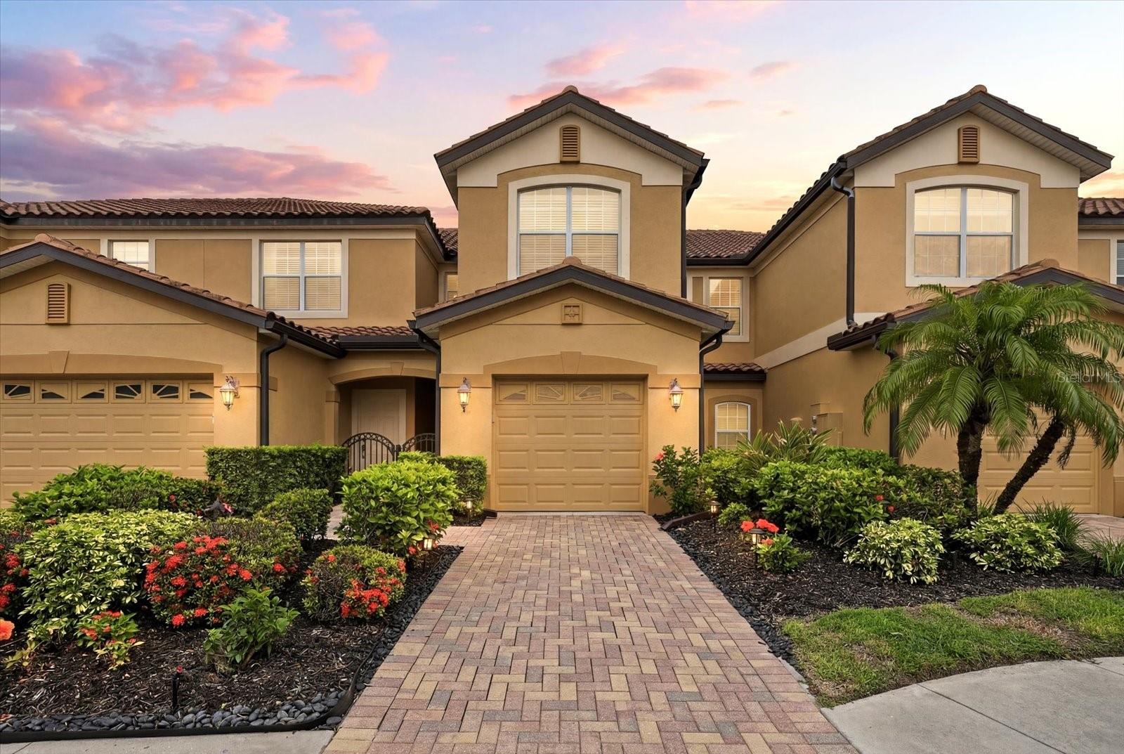 Welcome to GROUND FLOOR maintenance-free living in the highly sought-after gated community of MIRAMAR in the heart of Lakewood Ranch. Surrounded by beautifully landscaped grounds and picturesque views of the LAKEWOOD RANCH GOLF AND COUNTRY CLUB, this impeccably maintained ground-floor residence offers 2 bedrooms plus a den, 2 bathrooms, and a one-car garage with an open-concept great room floor plan designed for effortless Florida living. TILED THROUGHOUT-NO CARPET. Light and bright with a neutral color palette throughout, the home features elegant crown molding, tray ceilings, plantation shutters on all windows, hurricane-impact windows, and triple sliding glass doors that seamlessly connect indoor and outdoor living spaces. The screened lanai is finished with interlocking tile flooring and enhanced with an electric weather-protection shade, creating the perfect year-round retreat overlooking tranquil landscaped garden views. The spacious kitchen is designed for entertaining with granite countertops, stainless steel appliances, gas stove, oversized island seating, abundant cabinetry, and open flow to the dining and living areas. Recent updates provide exceptional value and peace of mind, including a 2025 air conditioner and furnace, 2025 refrigerator, stove, washer and dryer, 2023 interior paint throughout, and a 2022 hot water tank. The primary suite offers a relaxing retreat with dual vanities, granite countertops, and generous storage. This meticulous residence combines comfort, style, and low-maintenance convenience in one of Lakewood Ranch’s most desirable locations. Residents of Miramar enjoy private gated entry and resort-style amenities including a clubhouse, fitness center, heated pool and spa, outdoor kitchen, scenic dock, and beautifully maintained grounds, all with low monthly fees.
Ideally located just minutes from Waterside, UTC Mall, Lakewood Ranch Main Street, premier shopping and dining, downtown Sarasota, and the Gulf Coast’s world-famous beaches, this exceptional home offers the very best of the Florida lifestyle. You can now LIVE where others only dream to vacation!