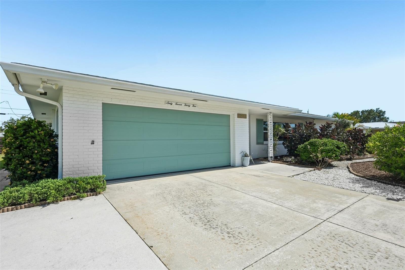Prepare to be impressed. This fully remodeled Gulf Gate gem is a rare opportunity, offering 1,659 square feet of beautifully reimagined living space where luxury meets everyday comfort.

From the moment you step inside, you’re welcomed by a bright, open-concept layout designed for modern living and effortless entertaining. Expansive sliding glass doors lead to a spacious screened-in lanai, seamlessly blending indoor and outdoor living — the perfect setting for morning coffee, weekend gatherings, or relaxing evenings.

The brand-new custom kitchen is truly the heart of the home, featuring two-tone solid wood cabinetry, elegant quartz countertops, a marble backsplash, and new GE stainless-steel appliances. Every finish was thoughtfully selected to create a refined yet inviting space.

The primary suite offers a peaceful retreat with a walk-in closet and a spa-inspired ensuite bathroom complete with a new double vanity, designer tile shower, and upgraded fixtures as well as a dedicated recirc pump for near instant hot water. Throughout the home, new luxury vinyl plank flooring, fresh interior paint, modern lighting, ceiling fans, and new interior doors create a clean, contemporary coastal feel.

Major upgrades provide peace of mind for years to come, including a new shingle roof (2026), new HVAC system (2026), new electric panel (2026), new insulation (2026), Water Heater(2026) and fully replumbed drains and supply lines.

Additional highlights include a large indoor laundry room with a custom boot bench, a two-car garage, and a triple-wide driveway offering ample parking.

Outside, you’ll appreciate one of the home’s most unique and practical features — a beautifully landscaped, low-maintenance front yard with no grass to mow. As one of the only homes in the neighborhood designed this way, it offers enhanced curb appeal while significantly reducing upkeep and water usage.

Just moments to Siesta Key’s sugar-white sands, this Gulf Gate home offers unmatched convenience — walk to A-rated Gulf Gate Elementary, 5 min to Costco, and a dynamic redevelopment of the former Sarasota Square Mall into a vibrant new retail, dining, and residential hub.

This is modern coastal living at its finest — move-in ready and designed to impress.

The final image is a rendering of what the backyard could be ( at 37 foot deep and 80 feet wide ) there is plenty of room to add a pool/outdoor kitchen.

Buyer’s agent to verify all MLS information including room sizes, utilities, and HOA (if applicable).