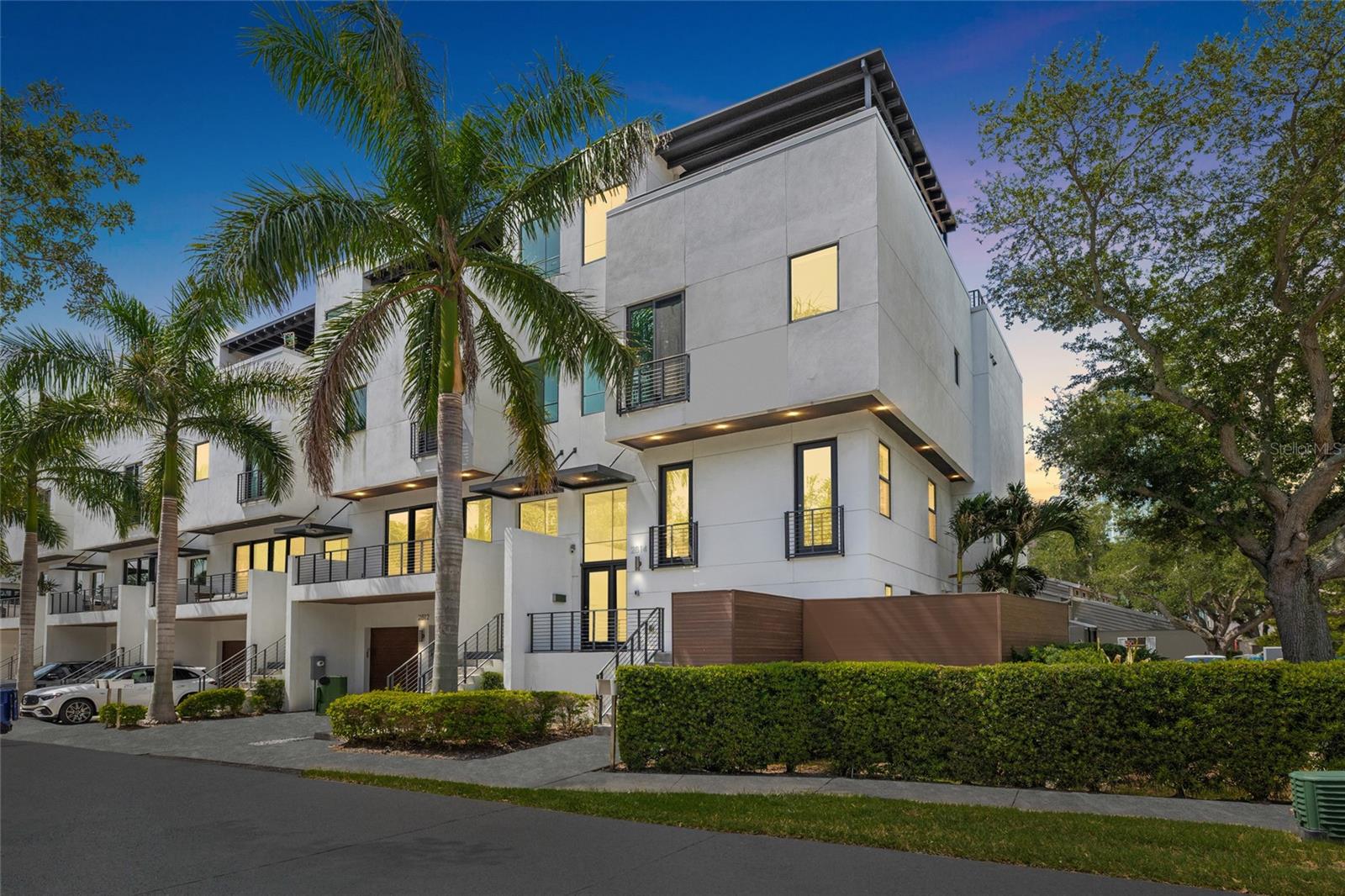 Virtually Staged. Ideally located in the heart of South Tampa, this beautifully appointed three-level townhome at 2814 W Barcelona Street offers over 3,000 + square feet of luxurious living space, featuring 3 bedrooms, 3 full bathrooms, and one half bath—within the highly sought-after Plant High School district. Just moments from Bayshore Boulevard, Hyde Park, and premier dining and shopping, this residence delivers the best of South Tampa living. Designed for both comfort and entertaining, the home showcases a light-filled, open-concept layout with spacious living and dining areas. The well-appointed kitchen is outfitted with high-end appliances, ample cabinetry, generous counter space, and seamlessly connects to the main living areas. A private elevator provides effortless access to all three levels, adding both convenience and accessibility. The upper features well-sized bedrooms, including a spacious primary suite with ample closet space and a well-designed bath. One of the home’s most impressive features is the rooftop terrace complete with a pergola—perfect for relaxing or entertaining while enjoying views of iconic Bayshore Boulevard. Additional highlights include a two-car garage with driveway parking and low-maintenance living. This is a rare opportunity to own a spacious townhome in one of Tampa’s most desirable locations.