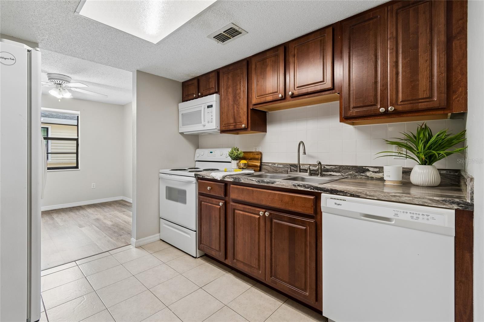 GARDENS OF FOREST LAKES CONDO THE - Residential