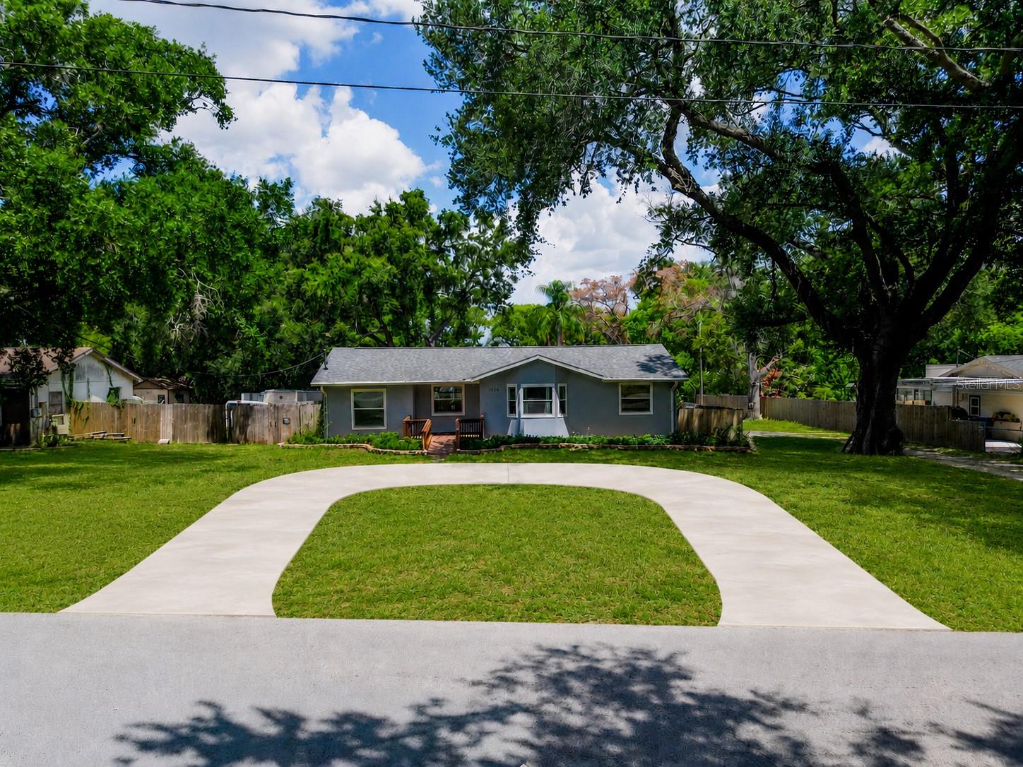 Virtually Staged. ** Motivated seller offering buyer concessions with acceptable terms. ** 
Welcome to this lovely 4-bedroom, 2-bath home offering 2,287 sq. ft. of living space on a spacious 0.37 acre lot with NO HOA and NO CDD! Enjoy a modern kitchen featuring a cooktop, double built-in wall ovens, built-in microwave, range hood, and brand-new refrigerator. A new roof (2025) adds peace of mind, and the seller will be installing new 2¼" faux wood blinds on all major windows throughout the home. Seller will consider installation of a proposed 30-foot half-circle radius driveway, subject to permitting and approval requirements, for an additional cost $15K. Property may also be purchased without the driveway improvement.

The oversized primary suite features dual walk-in closets, a spacious en-suite bath, and French doors leading to a private deck. Outside, you'll find a detached garage/workshop, storage shed, and plenty of room for your boat, RV, trailer, and other toys. An access road along the side of the property may allow for a future double gate with the neighboring owner's permission.

Conveniently located in the heart of Valrico, just minutes from shopping, dining, parks, schools, and major roadways. This move-in-ready home offers the perfect combination of space, privacy, and convenience.