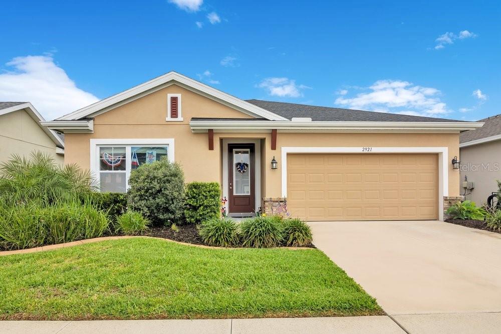 Welcome to 2921 Deerberry Lane, where comfort, style, and Florida living come together beautifully! This spacious home offers the perfect blend of open-concept living and everyday functionality, featuring bright living areas, generously sized bedrooms, and a layout designed for both relaxing and entertaining. The kitchen is ready for everything from quick breakfasts to holiday feasts, while the private backyard provides the ideal spot for grilling, gathering, or simply soaking up the sunshine. The home has permanent holiday lighting on the front and rear patios operated by an app to change with the festivities!  HVAC contains UV lighting and Power Surge protector provided by Seco Electric is included.  The gated community is part of a larger Serenoa community offering resort style pool and splash pad, fitness center, clubhouse, playground, dog park, weekly activities for all and four major festivals - and internet/WIFI and cable are all included in the HOA fees!  Located in the heart of Clermont, you'll enjoy convenient access to shopping, dining, parks, top-rated attractions, and major roadways. Opening soon will be direct access to Orange County and minutes from theme parks!  Whether you're searching for a primary residence or investment opportunity, this home checks all the boxes. Don't let this one become the house you "almost" bought—schedule your showing today!