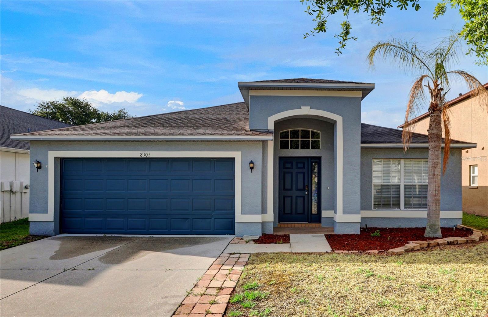 One or more photo(s) has been virtually staged. Welcome to 8105 Tar Hollow Drive in the highly sought-after Carriage Pointe community of Gibsonton, Florida. This beautifully updated 4-bedroom, 2-bath home offers nearly 2,000 square feet of stylish living space with peaceful pond views, soaring vaulted ceilings, and a desirable split-bedroom floorplan. Step inside to an open and airy layout featuring oversized tile flooring, abundant natural light, and spacious living and dining areas designed for both everyday living and entertaining. The updated kitchen showcases rich espresso cabinetry, quartz countertops, stainless steel appliances, mosaic backsplash, recessed lighting, and a large center island overlooking the main living space. A custom built-in wet bar with beverage refrigerator, sink, upper glass display cabinetry and wine storage.  The private primary suite is positioned at the rear of the home with tranquil water views and features a spacious ensuite bath with dual sinks, soaking tub, separate shower, enclosed water closet, and walk-in closet. Secondary bedrooms are tucked away down a separate hallway, providing privacy and flexibility for family, guests, or a home office. Enjoy Florida living year-round from the screened and covered lanai overlooking the fully fenced backyard and peaceful pond setting with no direct rear neighbors. Major updates include a new roof in 2022, water heater in 2022, and HVAC system in 2017. Carriage Pointe offers outstanding community amenities including a resort-style pool, clubhouse, fitness center, playgrounds, and basketball courts. Conveniently located near I-75, US-41, and US-301, providing easy access to Tampa, MacDill Air Force Base, Downtown Tampa, Ybor City, shopping, dining, Tampa International Airport, Sarasota, and Florida’s beautiful Gulf Coast beaches.