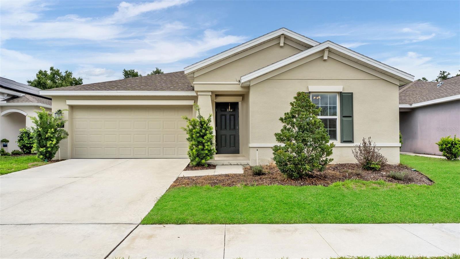 Built in 2022 and thoughtfully designed for comfortable, easy living, this 3-bedroom, 2-bath home offers 1,560 square feet in the welcoming community of Liberty Ridge. From the covered front porch to the fully fenced backyard, this home combines modern finishes, a functional layout, and inviting spaces inside and out. Step inside to a bright, open-concept floor plan designed to keep everyday life connected. The kitchen sits at the heart of the home, overlooking both the dining area and spacious living room, making it easy to cook, entertain, or simply enjoy time together. Stainless steel appliances, solid surface countertops, a large pantry, and generous cabinet and prep space create a kitchen that is both stylish and practical. The split-bedroom layout provides privacy, with the owner’s suite offering a comfortable retreat complete with dual sinks and an oversized walk-in closet. Two additional bedrooms and a full guest bathroom provide flexibility for family, guests, a home office, or hobby space. Outdoor living is just as enjoyable with a back patio overlooking the fully fenced yard, offering plenty of room for pets, play, gardening, or creating your own outdoor entertaining space. The home is positioned on a quiet street near the end of the road, adding to its peaceful residential feel. A two-car garage provides convenient parking along with additional storage space. Built with EcoSmart features and equipped with solar power designed to help offset electricity usage, this Lennar-built home offers a thoughtful combination of comfort and efficiency. Liberty Ridge also features a community park and a meaningful patriotic monument honoring those who have served our country. Conveniently located in Bartow with access to Lakeland, Winter Haven, LEGOLAND Florida, and major routes connecting to the greater Tampa and Orlando areas, this home offers the opportunity to enjoy a quieter community setting while remaining within reach of shopping, dining, entertainment, and employment centers throughout Central Florida. If you have been searching for a newer home with an open layout, modern features, a fenced backyard, and room to truly settle in, this Liberty Ridge home is ready to welcome its next owner. Schedule your private showing and come see everything it has to offer. This home is move in ready and available for showings as soon as today. Schedule your showing to see all the potential to make this your own!