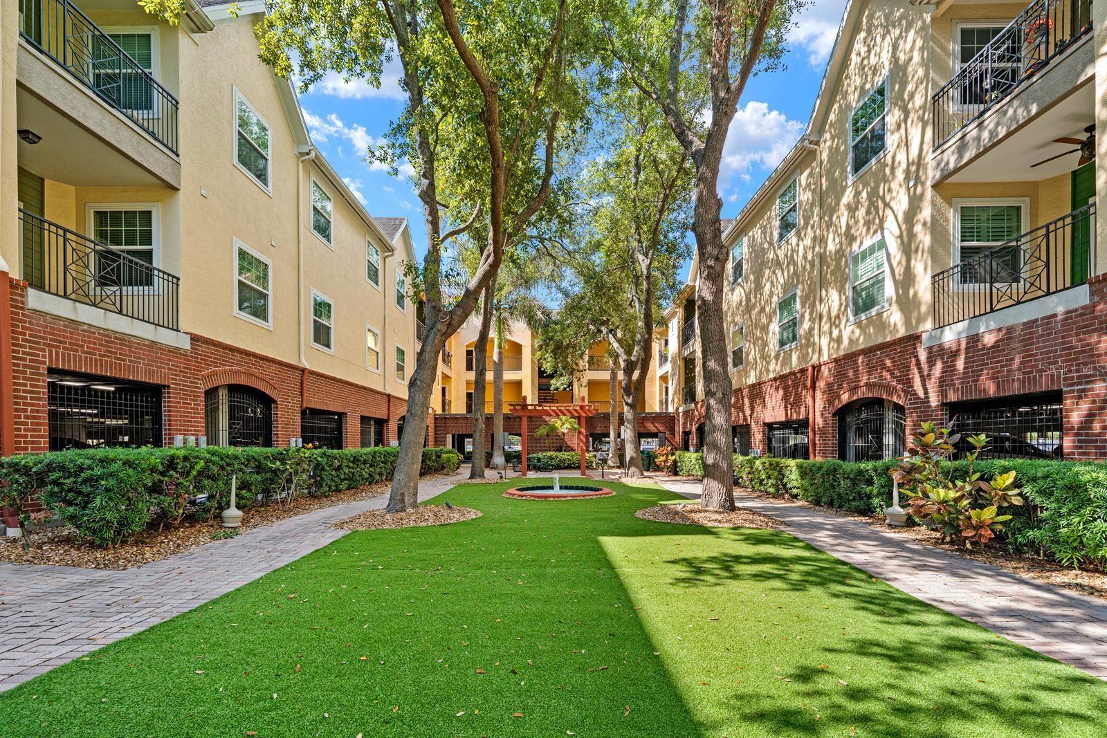 Want to be a part of the Ybor boom? Look no further than The Quarter at Ybor! This is being sold as a FULLY FURNISHED (or negotiable) and is a top floor condo, with a beautiful courtyard view balcony. The unit itself features high 9ft ceilings, updated flooring, quartz counters and stainless-steel appliances. It boasts a huge master bedroom with TWO walk-in closets. The bathroom has been recently upgraded with tile flooring, new vanity and an updated walk-in shower, as well as in unit washer and dryer. 
The community features two community pools with hot tub, fitness center, movie theatre, private event space, and on-site management. This is steps away from Ybor's historic & bustling 7th Avenue, as well as the new Gas Works Development. Don't miss out on this centrally located, move-in ready, fully furnished gem in the heart of Ybor!