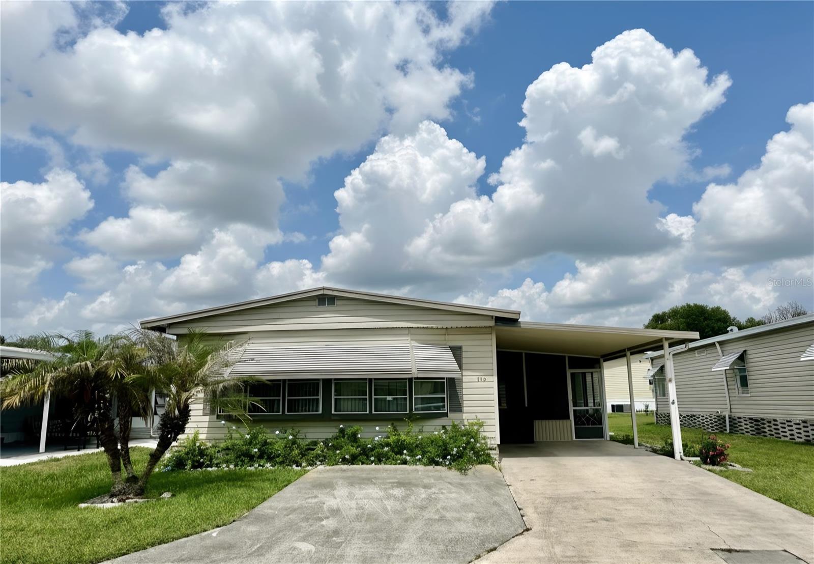 Great price improvement and you own your own land - no lot rent. Come and make this Charming 2-Bedroom, 2-Bath Home in Marianna Park, a 55+ Community, your new home. Featuring an open-concept layout, this residence offers a spacious living room, a separate family room, and a bright eat-in kitchen. The primary and secondary bedrooms include walk-in closets, providing ample storage space. Enjoy outdoor living with a 16’ x 11’ screened porch, a storage room with laundry, and a convenient carport. A small HOA fee of just $39/month covers access to community amenities such as a clubhouse, shuffleboard courts, a boat ramp, and a dock on Lake Marianna.  There is also an on-site storage area for travel trailers, boat and recreational vehicles. Don’t miss this exceptional opportunity to own a low maintenance home in a friendly neighborhood- schedule your private showing today!