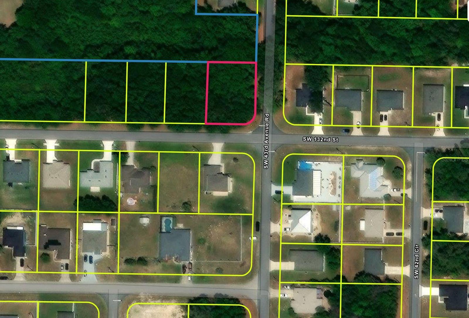 Rare corner homesite opportunity in the growing Marion Oaks community of Ocala. Located at the intersection of SW 132nd Street and SW 43rd Avenue Road, this oversized corner parcel offers exceptional visibility, flexible home design options, and strong long-term investment potential. Surrounded by established homes and ongoing residential development, the property is ideally suited for builders, investors, spec-home construction, or a future primary residence. The wooded setting provides the opportunity to preserve mature trees for privacy while creating a custom homesite tailored to today's buyer preferences. Conveniently located near Marion Oaks Elementary School, neighborhood amenities, shopping, dining, healthcare services, and major transportation routes including Highway 484 and I-75. Utilities are available in the area, supporting future development. With continued population growth and increasing demand for new construction homes throughout Ocala and Marion County, this corner lot represents an excellent opportunity for a build-to-rent project, resale investment, or long-term land acquisition in one of Central Florida's most active residential markets.
