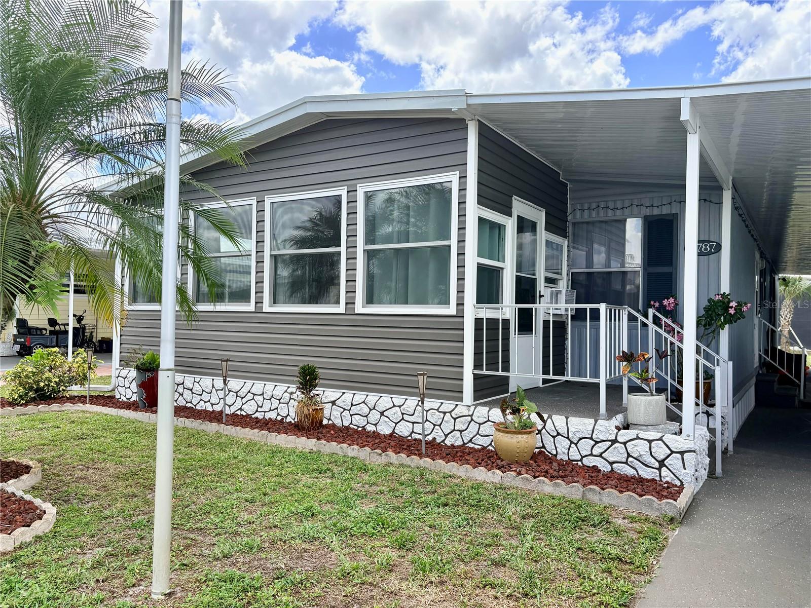 Well-maintained 2-bedroom, 2-bath manufactured home in desirable Laurel Estates, where you own the land and enjoy a low monthly maintenance fee. Located outside the flood zone, this property offers peace of mind and affordable Florida living. Step inside to a spacious layout featuring a large living room and dedicated dining area, perfect for hosting friends and family. The home includes several valuable updates, including a newer lanai, carport, and roof, plus a reverse osmosis system for added convenience. The primary suite features a newer walk-in shower, and the guest bedroom and bath provide comfortable accommodations for visitors. Laundry is located in the attached shed, keeping the interior neat and organized. Laurel Estates is a friendly, active 55+ community close to shopping, dining, and all the essentials of North Fort Myers. This home is move-in ready and an excellent opportunity for seasonal or full-time residents.