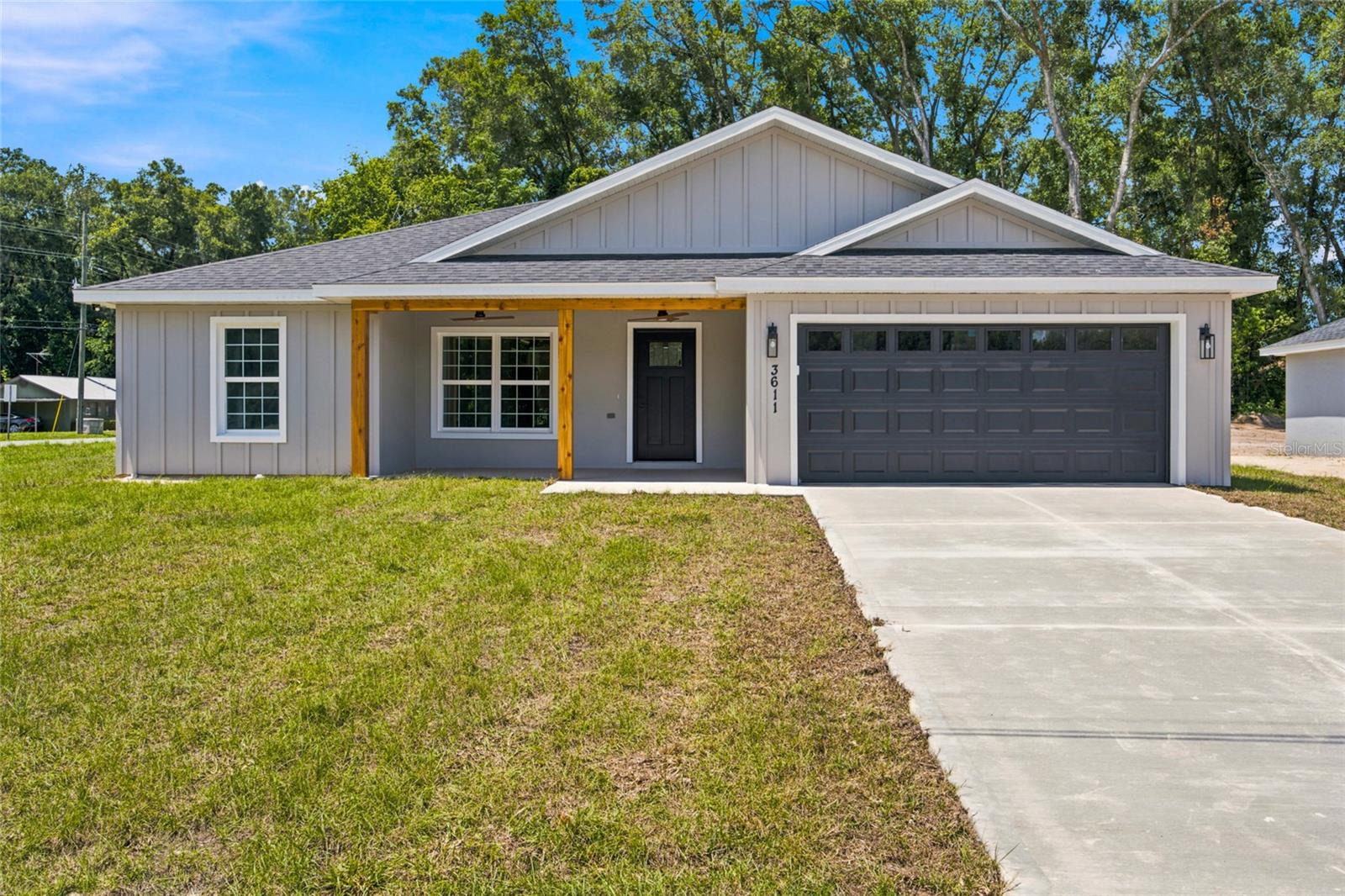 Welcome to the Marquez Model, a beautifully designed 3-bedroom, 2-bathroom home with a 2-car garage that blends modern finishes with farmhouse charm. Situated on a 0.29-acre corner lot, this home offers added outdoor space, privacy, and curb appeal.

The open-concept floor plan provides a seamless flow between the living, dining, and kitchen areas, creating a spacious and functional layout ideal for everyday living and entertaining. Interior features include waterproof laminate flooring throughout, wood cabinetry, quartz countertops, and a large center island. The kitchen is equipped with dark stainless steel appliances and overlooks the main living space. French doors provide natural light and lead to the backyard.

The primary suite offers a generous layout and a beautifully finished bathroom featuring a modern walk-in shower with a sleek glass shower door, creating a clean, upscale look. Additional highlights include modern ceiling fans throughout, an inside laundry room, and a spacious attached garage with room for vehicles, storage, and everyday convenience.

Exterior details showcase cedar plank accents and board-and-batten design for a desirable farmhouse aesthetic, along with a spacious front porch perfect for relaxing. The home also includes a 6-foot vinyl privacy fence, adding privacy and functionality to the outdoor space.

A well-balanced combination of style, durability, functionality, and lot appeal—schedule your showing today.