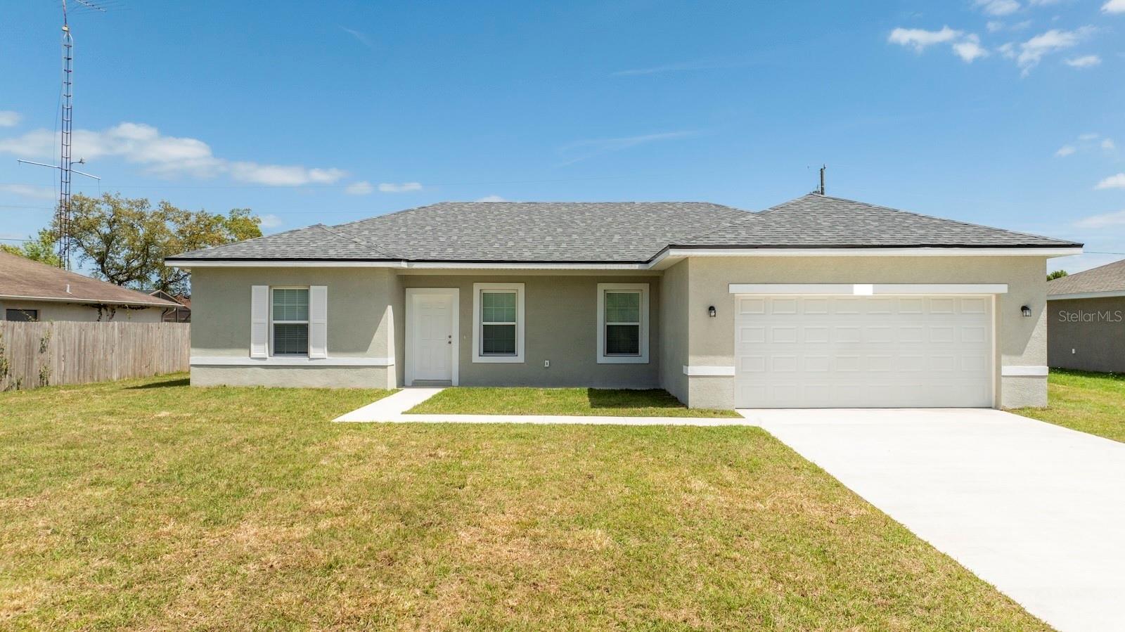 Under Construction. **Brand new 3-bed/2-bath house with many upgrades. Tile all over the place, even in the spacious bedrooms. Granite countertops in the kitchen and bathrooms. This home will have stainless steel appliances, including a microwave, dishwasher, refrigerator, and range. Ceiling fans, blinds, and a mailbox are included as well. Take advantage of this opportunity!! The color and finishes of the home's interior and exterior can be different. 2/10 Warranty included.