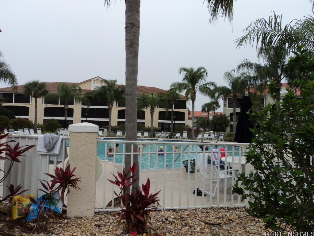 ONE OWNER FIRST FLOOR CONDO WITH FULL VIEW OF THE POOL AND DIRECTLY ACROSS FROM THE RIVER.HOME HAS SEVERAL BUILT-INS INCLUDING BAR AND BOOKSHELVES AND VANITY IN THE GUEST BEDROOM.FLORIDA ROOM IS TILED WITH A WALL OF WINDOWS.DELIGHTFUL FURNISHINGS ADD TO THE APPEAL OF THIS EASY ACCESSIBLE CONDO WITH NEWER KITCHEN APPLIANCES AND A/C.WATCH THE SUNSETS FROM YOUR LIVING ROOM AND WALK THE BOARDWALK TO THE RIVER AND ALL BOUCHELLE AMENITIES INCLUDING 2 POOLS, TENNIS AND CLUBHOUSES.COMPLEX JUST MINUTES TO THE BEACH, SHOPPING AND THE CENTER OF NSB RESTURANTS AND  ENTERTIANMENT. ;LocationDescription: Condo ;Water: City