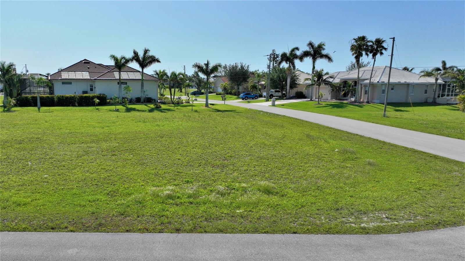 Attention Investors, Buyers, & Builders. Don't miss the opportunity to purchase 1 of 6 Contiguous lots on Belie Way, in the growing community, Burnt Store Lakes. Lot is located on the corner of Cedar Rapids Rd & Belie Way, with Eastern Rear exposure. Lot dimensions are 105' x 120' x 83' x 95.' Lot is an oversized corner lot & completely cleared, ready for your custom dream home. 5 other adjacent lots also for sale. See MLS A4568915, A4568912, A4568920, A4568909, and A4568908 making these 6 lots 1.5 acres if combined. This growing lake front community is located on the southern shores of Charlotte Harbor and features 11 large lakes, a resident’s park & picnic pavilion, canoe/kayak launch to Charlotte Harbor, picturesque bike/walking paths, plus streetlights and sidewalks.  This resort like atmosphere continues into the adjacent community (Safe Harbor/Burnt Store Marina & Golf) offering public access to its full-service World-Class Marina, plus executive golf course & dining destinations. The Burnt Store Corridor is a short ride to Punta Gorda and Fort Myers airports. Community features include friendly deed restrictions, public water & sewer and most homes are custom. There is just one Home Owners Association fee of $464 per year. Call agent for builder information and make these lots yours today.