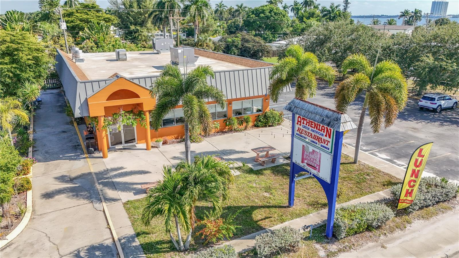 1130 N Tamiami Trail is a high visibility, free standing restaurant positioned directly on US 41 in North Fort Myers. Sitting on 0.81 acres with 3,460 square feet under air, this property offers a fully built out dining room with seating capacity for 157 guests, an existing drive thru, and a 4COP liquor license. Two curb cuts on US 41 provide excellent ingress and egress, while rear access connects directly to Pondella Road, a major east west corridor. Nearly 59,000 vehicles/day travel past this site, making it ideal for any restaurant, retail or service based operation seeking immediate exposure. Zoned C-2 with a Future Land Use of Intensive Development, the property supports a wide range of higher intensity commercial uses and offers strong redevelopment potential.
