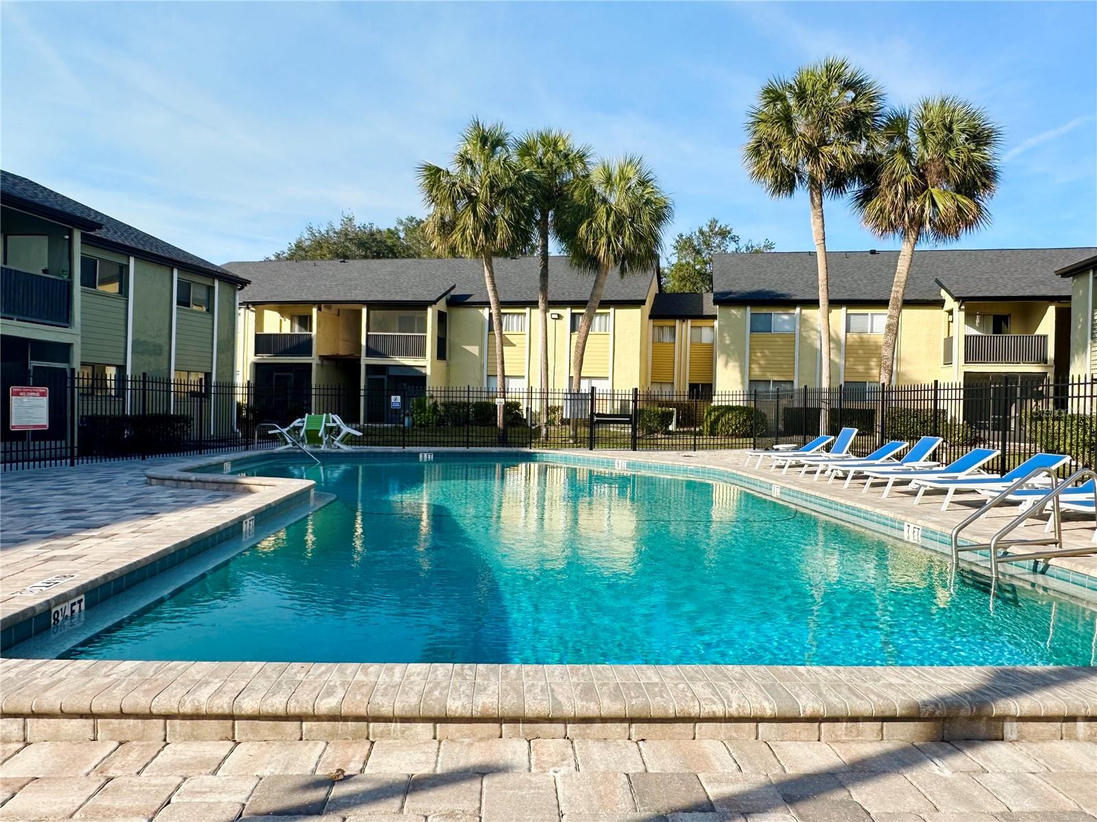 Welcome to 912 Lake Destiny Rd Unit D, a charming 3-bedroom, 2-bathroom condo offering 1,112 square feet of comfortable living space. Located on 1st floor, this residence features a well-designed floor plan that creates an inviting atmosphere. The condo boasts beautiful new rustic bay tile floors throughout, enhancing its cozy appeal. The screened patio provides a serene spot to relax, offering poolside views and a tranquil setting on the shores of Lake Destiny. Residents can enjoy community amenities such as a swimming pool, tennis Ct and fitness center. The unit also includes in-unit laundry facilities, air conditioning, and is pet-friendly. Conveniently located near restaurants and shopping centers, this condo offers a quick commute to downtown and Altamonte Springs, making it an ideal choice for those seeking both comfort and accessibility. Schedule a private showing today and make this cozy condo your new residence. Matterport 3D tour is available for virtual showing and provide accurate room measurements.