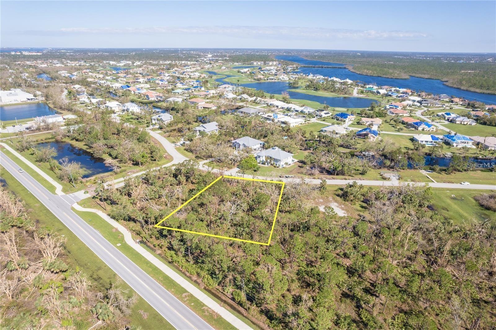 Welcome to 10121 Creekside Drive in Placida, an extraordinary opportunity to own a .61-acre waterfront homesite within the exclusive, gated community of Coral Cove. This private enclave is comprised of just 27 custom residences, offering a rare blend of security, serenity, and refined coastal living. What truly sets this property apart is the deeded private boat dock, delivering direct access to Lemon Bay, the Intracoastal Waterway, and onward to the open waters of the Gulf of Mexico via a single bridge with approximately 10’4” clearance—ideal for a wide range of vessels and an active boating lifestyle.

Perfectly positioned between the world-class beaches of Boca Grande and the relaxed coastal charm of Manasota Key, this location allows you to enjoy some of Southwest Florida’s most celebrated shoreline, fishing, and outdoor recreation within minutes. Daily conveniences are equally close at hand, with Publix, Winn-Dixie, and local markets nearby, along with boutique shopping, dining, and marinas throughout Placida, Englewood, and Port Charlotte. Medical needs are easily met with Englewood Community Hospital and HCA Florida Fawcett Hospital both within a short drive.

Outdoor enthusiasts will appreciate proximity to Don Pedro Island State Park, local preserves, kayaking trails, and nature parks, while golfers and beach lovers alike will find endless options close to home. Commuting and travel are seamless with convenient access to Placida Road (SR-775), US-41 (Tamiami Trail), and I-75, connecting you effortlessly to Venice, Sarasota, Punta Gorda, and beyond. Punta Gorda Airport (PGD) and Southwest Florida International Airport (RSW) provide excellent regional and national flight options.

Coral Cove maintains architectural standards designed to preserve the upscale character of the community, including a minimum of 2,200 square feet under air, metal roofing, and a side-entry garage, allowing you to build a custom coastal residence that complements both your lifestyle and the surrounding homes.

Secure, private, and ideally located, this gated waterfront community offers a rare opportunity to create a bespoke coastal retreat with boating at your doorstep and Florida’s best beaches, amenities, and infrastructure just moments away. Opportunities like this in Coral Cove are limited—schedule your private showing and take the first step toward your Florida waterfront lifestyle today.
