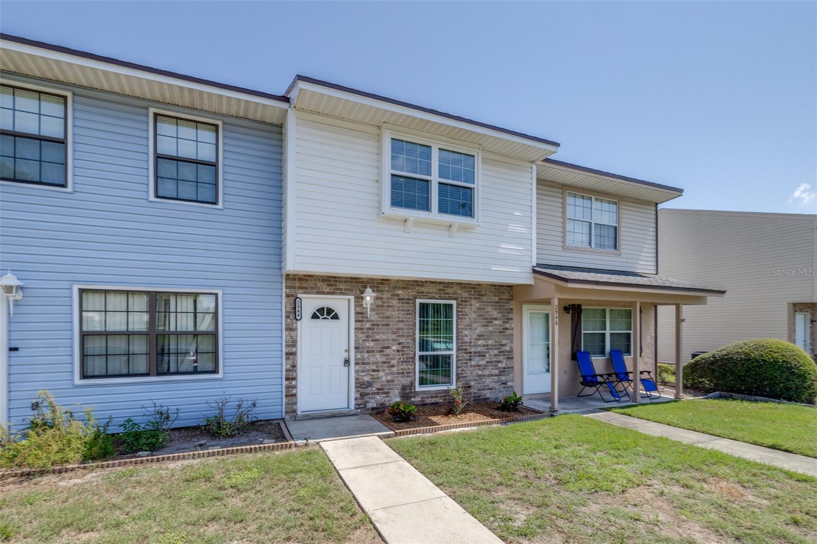 Beautifully updated 2-bedroom, 1.5-bathroom townhouse for sale in central Lakeland! The long-time owners have had incredible pride of ownership on this property. From the architectural shingle roof and AC that were installed in 2021 to the windows being updated in 2023, this home has been well taken care of. Outside you will notice the architectural shingle roof, pleasant landscaping, and private parking spaces. Upon entering the home, you will see a nice-sized living room that features gorgeous porcelain tile flooring, a freshly painted interior with updated light fixtures throughout the home, and updated double-paned energy-efficient windows that were installed in 2023. In the rear of the home you have a kitchen/dining area that features that same sharp-looking tile flooring, all new stainless steel appliances, a convenient inside laundry area, and a half bathroom. The second story has both spacious bedrooms and the primary bathroom. The bedrooms and the stairwell feature brand-new carpet. Inside the bathroom you will find a shower/tub combination, good-looking laminate flooring, and updated light fixtures. The private fenced rear patio area has plenty of space to grill out, and it overlooks a beautiful pond. The HOA dues cover some maintenance of the exterior of the home, lawn cutting, and maintenance of the parking spaces. The Country Ridge Cove community is not too far from schools, shopping, and restaurants. Additionally, Lakeland maintains its small-town feel but offers attractions like Bonnet Springs Park and the fun and relaxing downtown Munn Park area, which hosts local events. This home is move-in ready! Do not miss the opportunity to own this beautifully updated home in Lakeland; schedule your showing today!