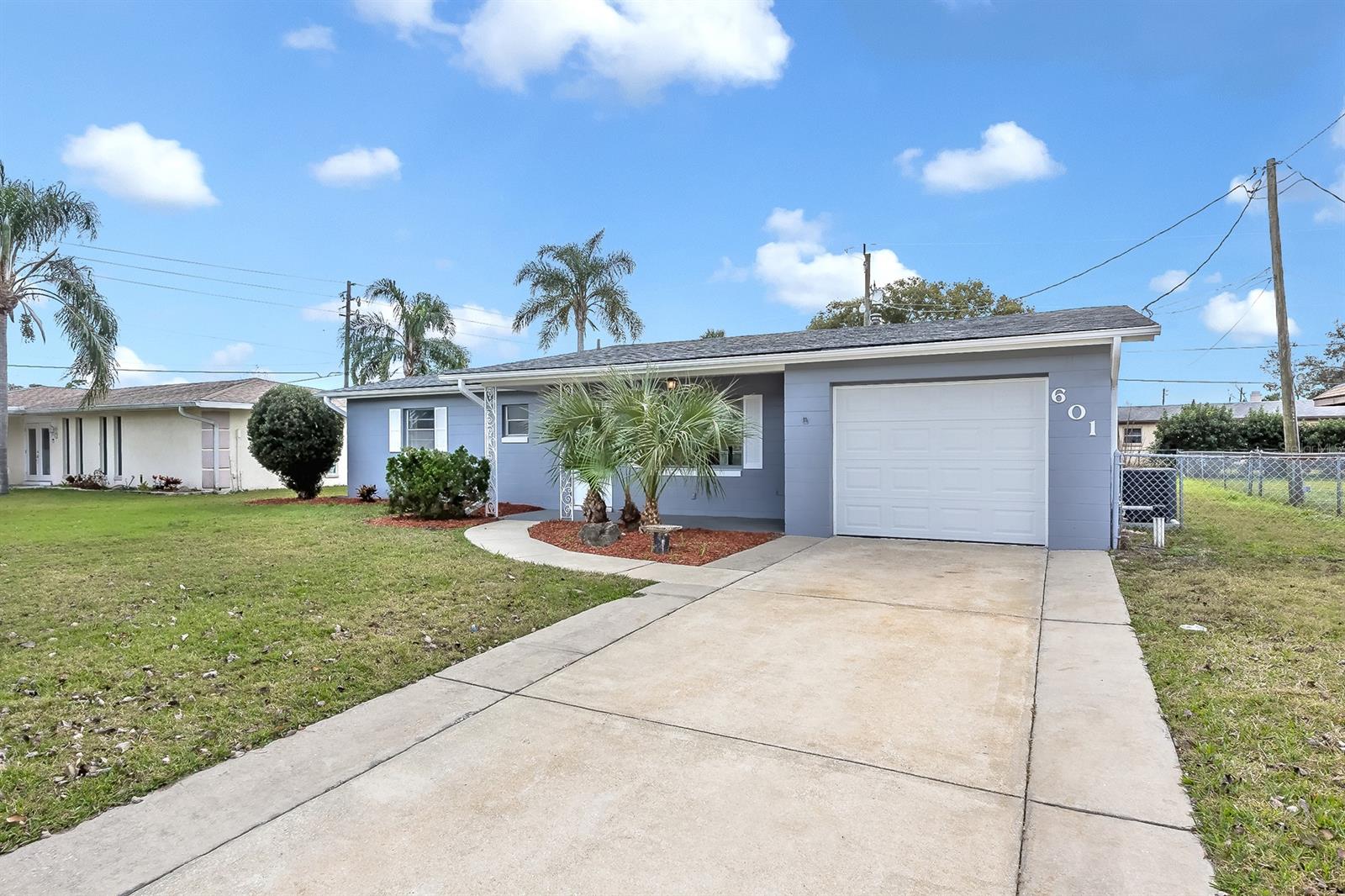 Completely renovated, new flooring, paint, roof, ac, updated bathrooms, etc. This spacious ranch style home has just been tastefully updated throughout. Kitchen features newly installed wood cabinets, granite counter tops, stainless steel appliances and much more. Home has been freshly painted inside and out. Home is centrally located and close to shopping, schools, I-95 and Daytona Beach Golf Course. There is also an office/bonus room/third bedroom. The southern exposed 12x38 lanai is great for entertaining and the large yard is fully fenced. All information is intended to be accurate but is not guaranteed ;Water: City