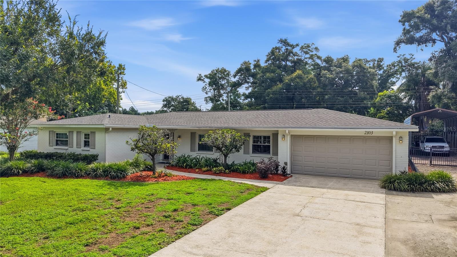 Welcome to this beautifully updated 3-bedroom, 2-bathroom home located in the heart of Brandon, Florida! Situated on a spacious 0.38-acre lot with NO HOA, NO CDD, and NO DEED RESTRICTIONS, this property offers the freedom and space you've been looking for.

From the moment you step inside, you'll appreciate the charm and character throughout. The home features formal living and dining rooms accented by decorative columns and built-in shelving, creating the perfect space for entertaining. The stunning kitchen is loaded with upgrades, including 42" maple cabinets, granite countertops, a mosaic tile backsplash, stainless steel appliances, a gas range, and an open layout overlooking the large family room.

Additional interior features include engineered hardwood floors, crown molding, ceiling fans, a decorative electric fireplace, plantation shutters, and a spacious laundry room with extra storage and room for a second refrigerator. Numerous recent updates include a newer roof, newer AC, resurfaced pool, new electric pool heater, new electrical panel, and much more!

The private primary suite offers a walk-in closet with built-in shelving and an en-suite bath, while the secondary bedrooms are generously sized and have ample closet space.

Step outside and enjoy Florida living at its finest with a heated, screened-in swimming pool and lanai overlooking the fully fenced backyard. The property also features a garden area, plenty of room for your boat and toys, a covered RV parking area, and an impressive 20x40 detached garage/workshop complete with a car lift, mini-split AC system, and air compressor.

This one-of-a-kind property offers endless possibilities and is conveniently located near shopping, dining, schools, and major highways. Don't miss this rare opportunity to own a truly special home in Brandon. Schedule your private tour today!