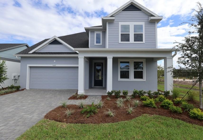Under Construction. Come see why the Edie plan won 1st place in the Parade of Homes. You'll be delighted by the timeless comforts and attention to detail of The Edie floor plan by David Weekley Homes. Expertly placed energy-efficient windows bathe the home with natural light. The gourmet kitchen is delightfully designed with the chef in mind and includes an oversized pantry, quartz countertops and designer finishes. Leave the outside world behind and luxuriate in the downstairs Owners' Retreat, featuring a contemporary ensuite bathroom with rain-head shower. Additional bedrooms are situated on the second floor, offering ample privacy, individual walk-in closets, and wonderful places to grow. Create lifelong memories together in the fun and inviting upstairs retreat. Build your future in charming Oakfield of Mount Dora. **Buyers may be eligible for mortgage financing at a reduced rate.