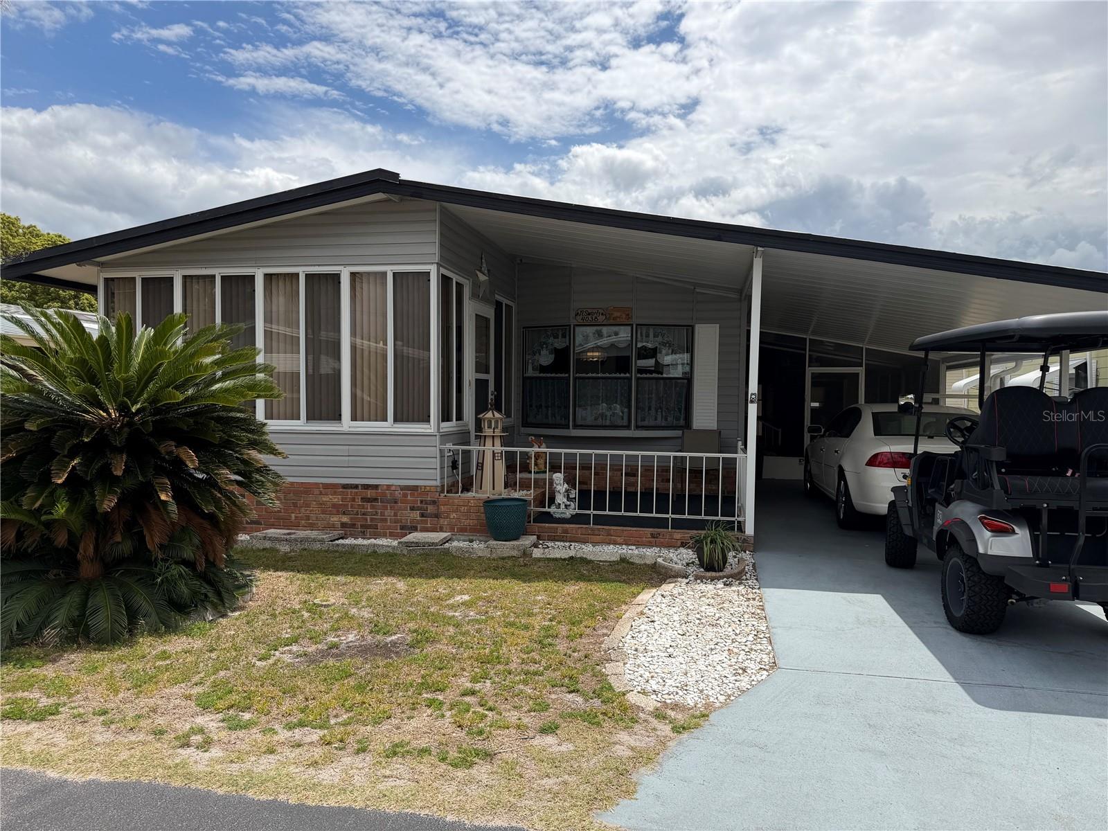 Welcome to paradise, in this 2/2 with a enclosed front porch, to watch the beautiful Florida sunsets. The gated 55 plus community offers many amenities such as tennis, fishing pier, two heated pools, shuffle board, miniature golf,  bocce ball, two club houses, fishing pier, plus many planned activities.