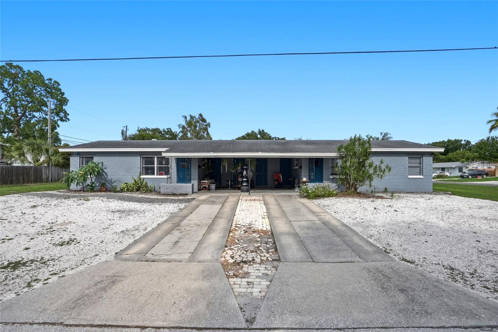 Discover an exceptional income-generating opportunity or the perfect house-hack at 7301 8th St N. This wonderfully maintained duplex sits on a spacious corner lot in a highly accessible location, offering effortless commutes to both vibrant Downtown St. Pete and Tampa.

Each side features a highly rentable layout: 3 bedrooms, 1 bathroom, a private carport, its own fenced backyard, and a covered outdoor laundry area.

Both units are currently income-producing with fantastic, reliable tenants already in place:

7301 8th St N (Right Side/Closest to 73rd Ave N): Occupied by a stellar long-term tenant paying $2,400/month. The current lease runs through September 4, 2026, after which it will transition to a month-to-month agreement.

7305 8th St N (Left Side/Closest to 74th Ave N): Currently bringing in $2,500/month. The initial 12-month lease has just concluded, and the tenants are continuing on a flexible month-to-month basis.

This property sustained no flood damage during Hurricanes Helene and Milton. Schedule your showing today!