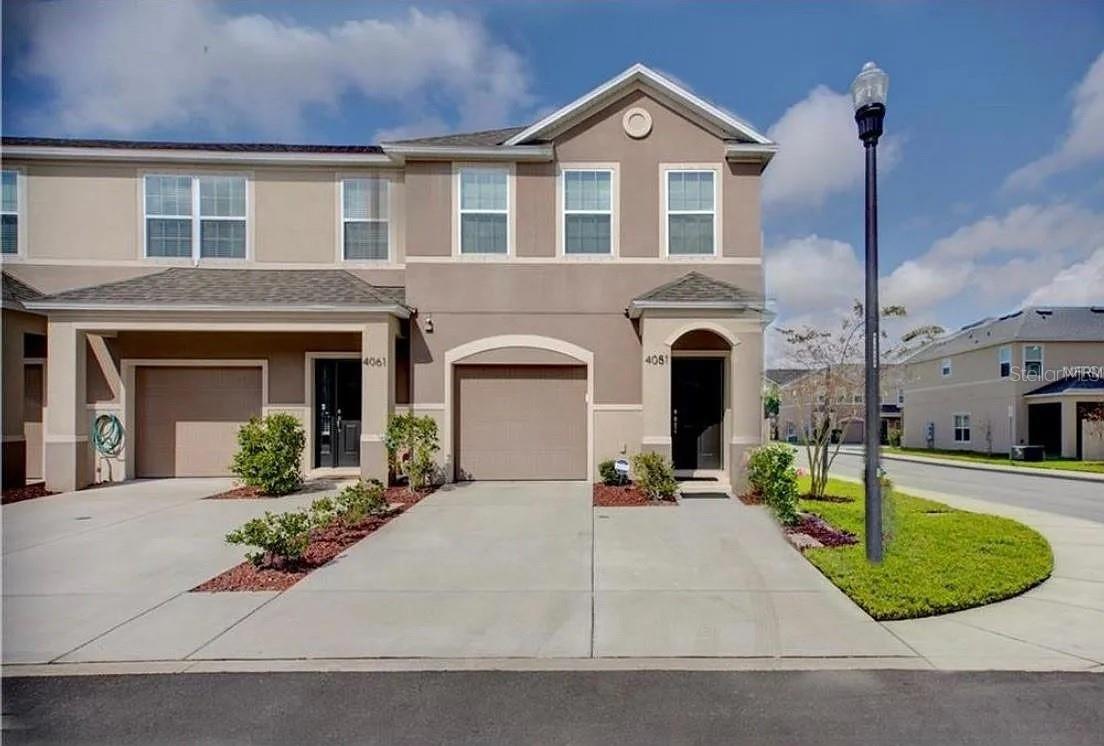 Beautiful end-unit townhome in the Village at Park Place! This spacious 3-bedroom, 2.5-bath offers approximately 1,500 sq. ft. of bright, open living space with an attached 1-car garage and screened lanai. High ceilings and extra windows fill the home with natural light, while the open-concept kitchen features granite countertops, 42" wood cabinetry, stainless steel appliances, and a breakfast bar overlooking the living and dining areas. The primary suite includes a dual-sink vanity and walk-in shower. Built with ENERGY STAR® features for improved efficiency and lower utility costs. The home is ideally located just steps from The Shoppes at Park Place, offering convenient access to shopping, dining, and entertainment. 
This plan gives you the privacy, outdoor living space and storage of a single-family home with the freedom and convenience of a maintenance-free lifestyle.