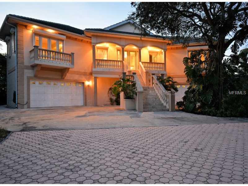 If you are seeking a home built like a fortress with loads of living directly on the gulf, do not miss this. The home has been constructed on 51 concrete pilings and is extremely solid from the interior to the exterior with minimal maintenance in mind. The main living floor encompasses four bedrooms and four full baths with 4,885 square feet.  There is additional living under A/C which could be used for guests, in-laws, movie theater, rec-room, fitness equipment, storage or just about anything. Total A/C square footage is approximately 7,000 sq. ft. This house is top-quality with granite, high-end appliances, custom millwork, travertine floors, lightning protection, elevator, Pella windows and doors, electric hurricane shutters, epay wood constructed decks and much more. The lower level garage area can accommodate five or six automobiles which is perfect for car collectors. The home is perfectly positioned on the lot to assure privacy from the road and still have a gulf side pool if desired.  The entire property is fenced with an electric gate at the driveway entrance which includes video monitoring equipment.  The average monthly electric bill is under $300.00 which proves superior construction for a home of this magnitude.