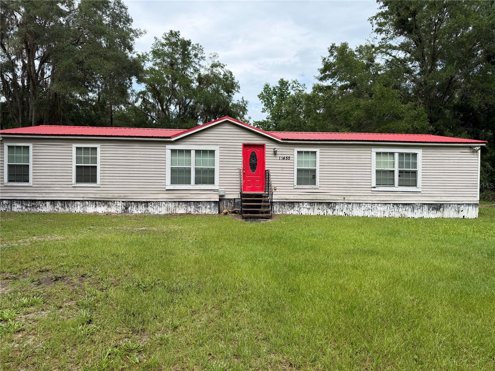 Nestled on a spacious 10 Acre parcel in the peaceful countryside of Reddick, this property offers the perfect opportunity for buyers seeking privacy, room to grow, and the charm of country living. The property features a mobile home that could benefit from a little TLC, making it an excellent opportunity for investors, first-time buyers, or anyone looking to add their personal touch and build equity.

Major updates have already been completed, including a new roof and a new AC, providing peace of mind for the next owner. Enjoy the freedom of rural living while still being conveniently located near Ocala, shopping, dining, and local amenities.

Whether you're looking for a primary residence, an investment property, or a peaceful retreat, this property