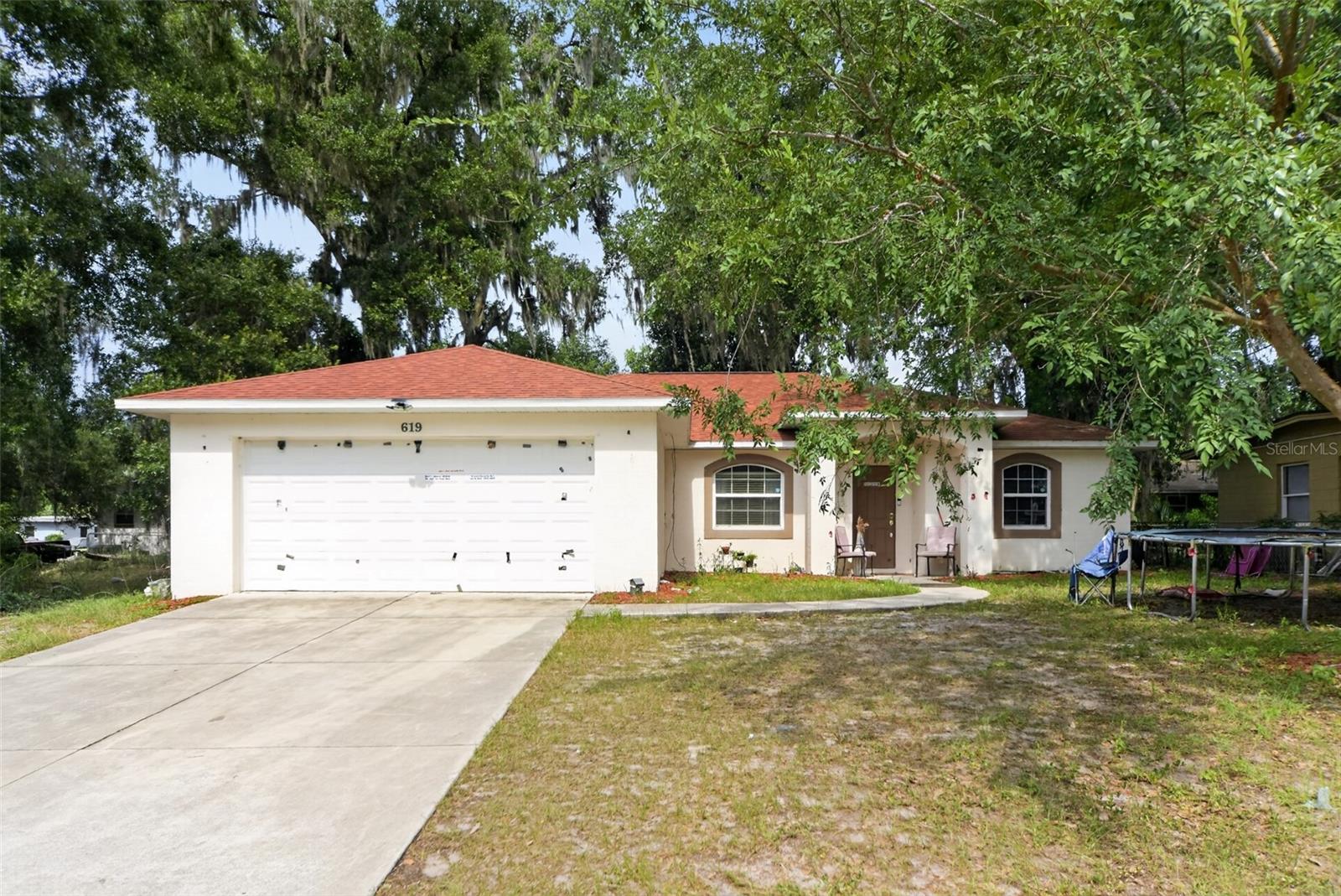 3 BEDROOM 2 BATH MOVE-IN READY HOME WITH NO HOA AND NO CDD IN EUSTIS! This well-maintained 2015-built home offers 1,612 sq ft of comfortable living space with an attached garage and a functional single-story layout perfect for everyday living. The big ticket items are taken care of — NEW ROOF approximately 3 years old, NEW WATER HEATER approximately 2 years old, and original 2015 plumbing and AC in working condition. Brick exterior and frame construction built to last. Open layout with a spacious living area, functional kitchen with all appliances included, and two full bathrooms. No HOA and no CDD mean no extra fees and no restrictions. Located in the charming City of Eustis in Lake County — just minutes from downtown Eustis, Lake Eustis, shopping, dining, parks, and convenient access to US-441 and SR-19 for an easy commute to Mount Dora, Tavares, Leesburg, and the greater Orlando area. All financing welcome including FHA, VA, and conventional. A great opportunity for first-time buyers or anyone looking for a solid move-in ready home at a great price in Central Florida — schedule your showing today!