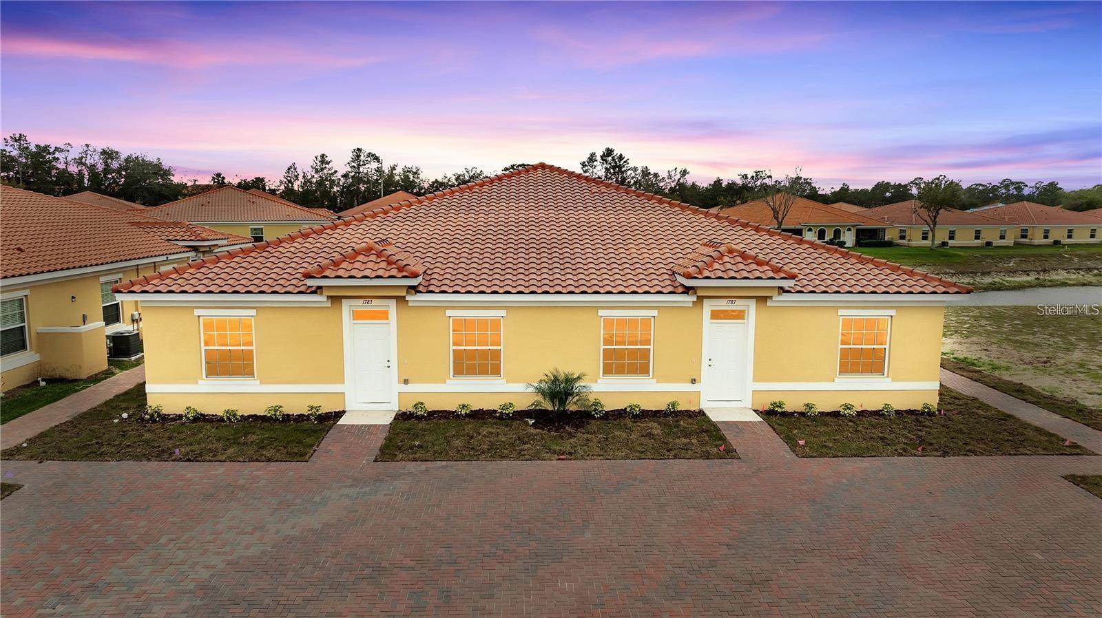 MOVE IN TODAY - Honesty Home Builders presents brand-new 2-bedroom, 2-bathroom villas in Tuscany Preserve, a private gated community. These modern quadplex villas boast Spanish-style Tiled roofs, adding timeless charm to the community’s exterior. These modern quadplex villas feature ceramic tile throughout, 42” cabinets, granite countertops, and state-of-the-art stainless steel appliances. Tuscany Preserve provides exclusive amenities including a private gym, clubhouse, pool, tennis and basketball courts. Each home owner has high-speed internet and hundreds of TV channels covered by the association, life here is effortless! All financing options accepted: FHA, VA, and Conventional. Ask about the builder's preferred lender and closing cost incentives. Short-term rentals and Airbnbs are allowed!